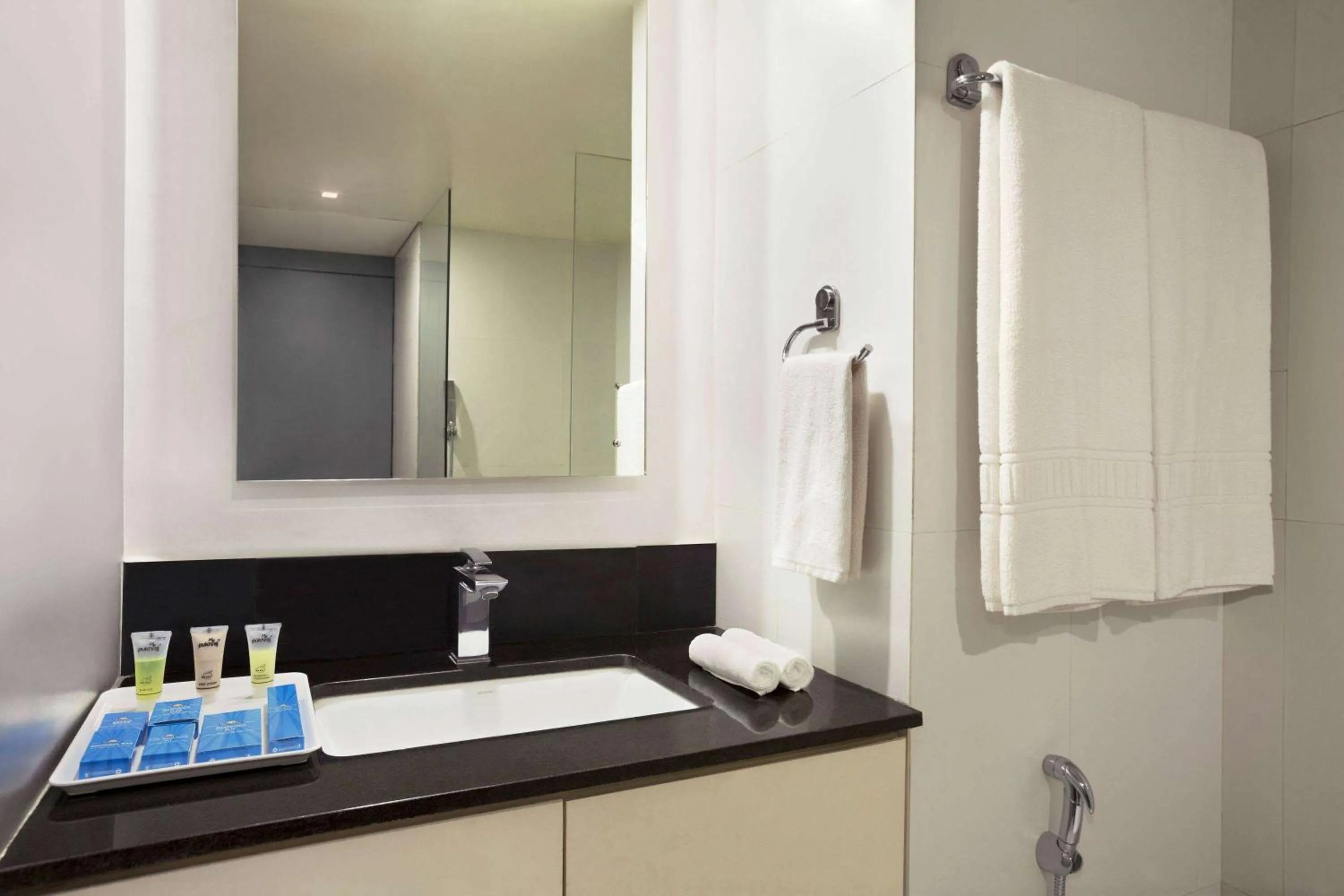 Bathroom in Days Inn & Suites by Wyndham Bengaluru Whitefield