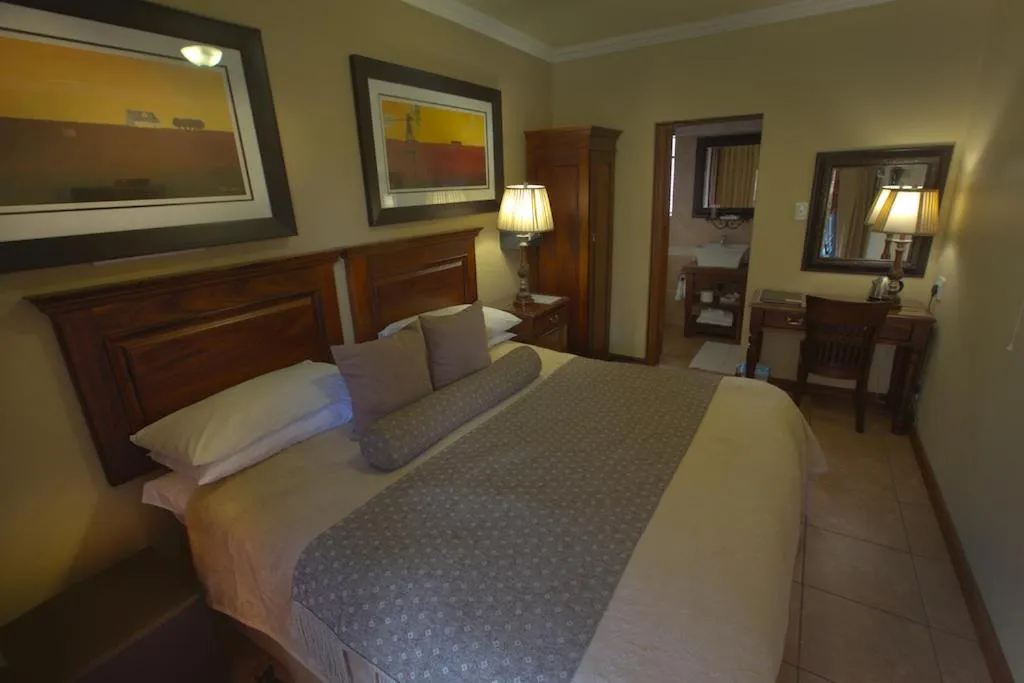 Bed in Le Cozmo Guesthouse