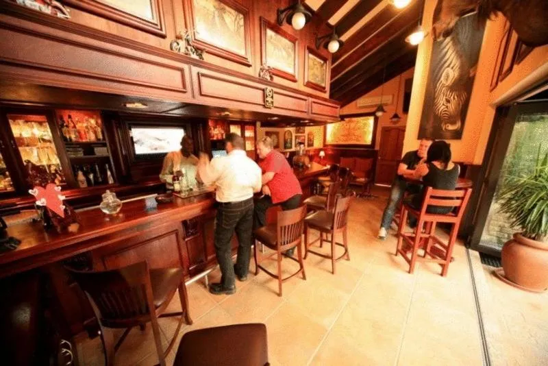 Lounge or bar in Le Cozmo Guesthouse