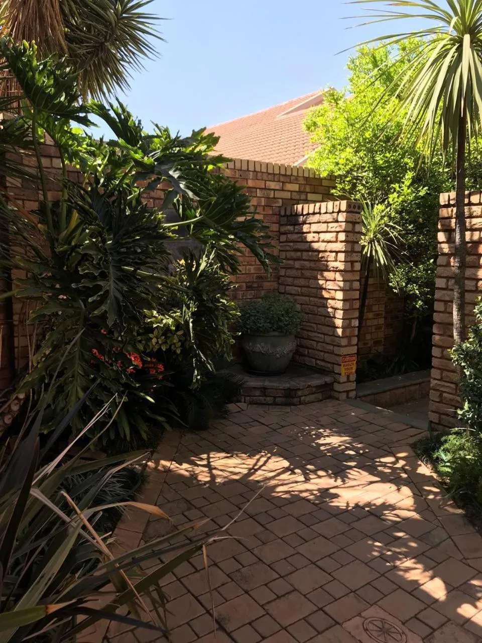 Property building in Le Cozmo Guesthouse