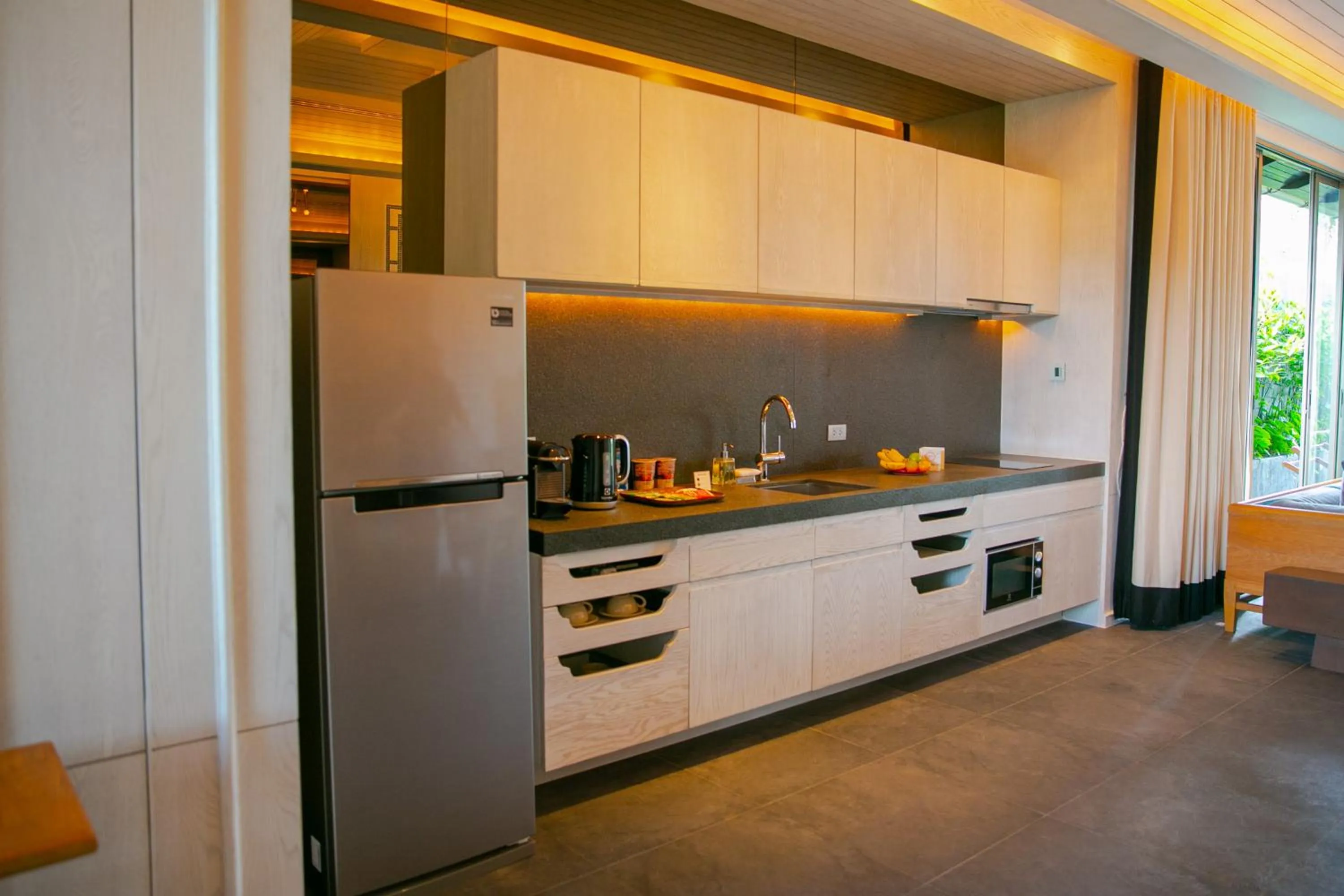 Kitchen or kitchenette in Baba Beach Club Natai Luxury Pool Villa Hotel by Sri panwa - SHA Plus