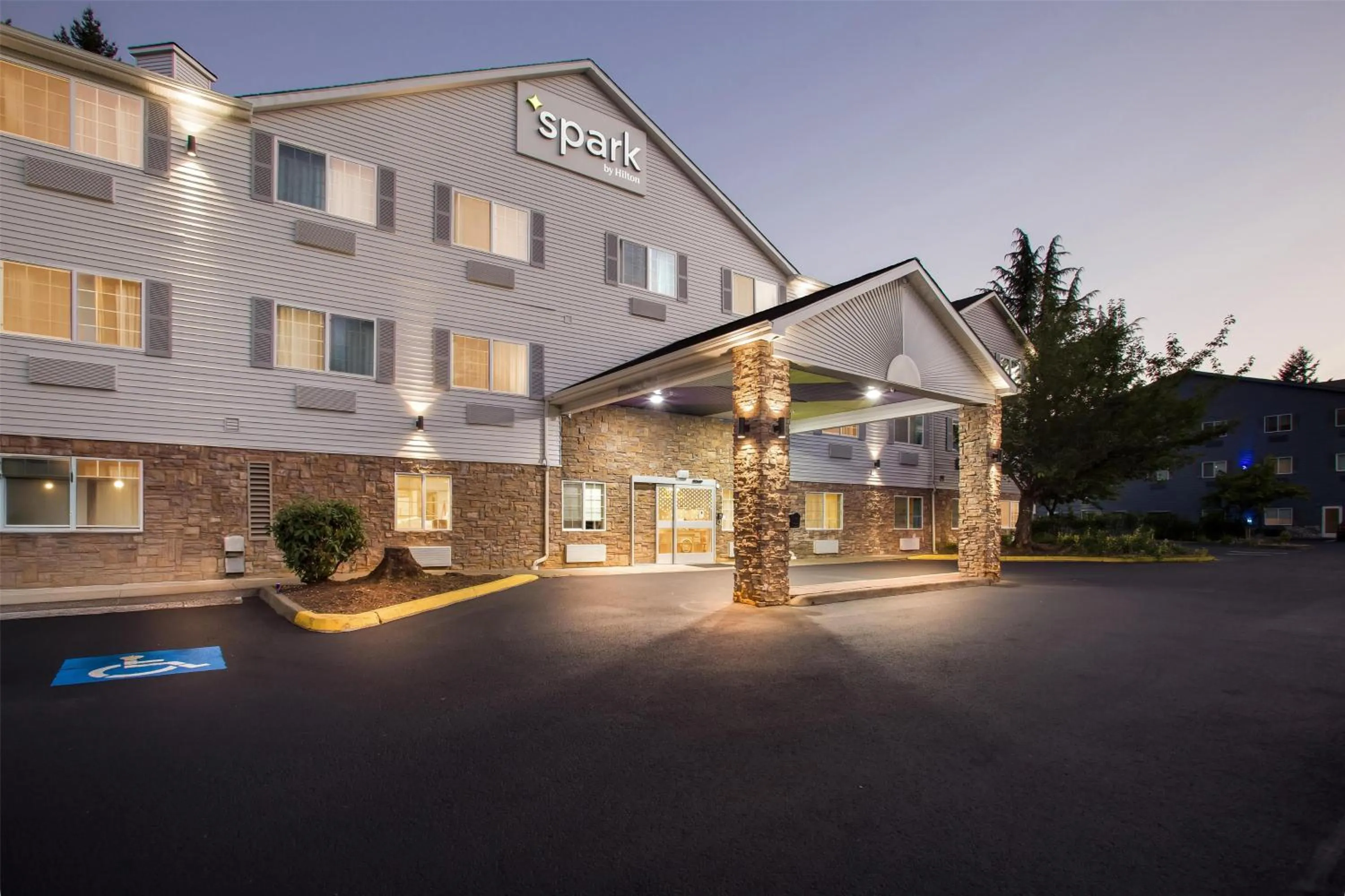 Property building in Spark by Hilton Tumwater