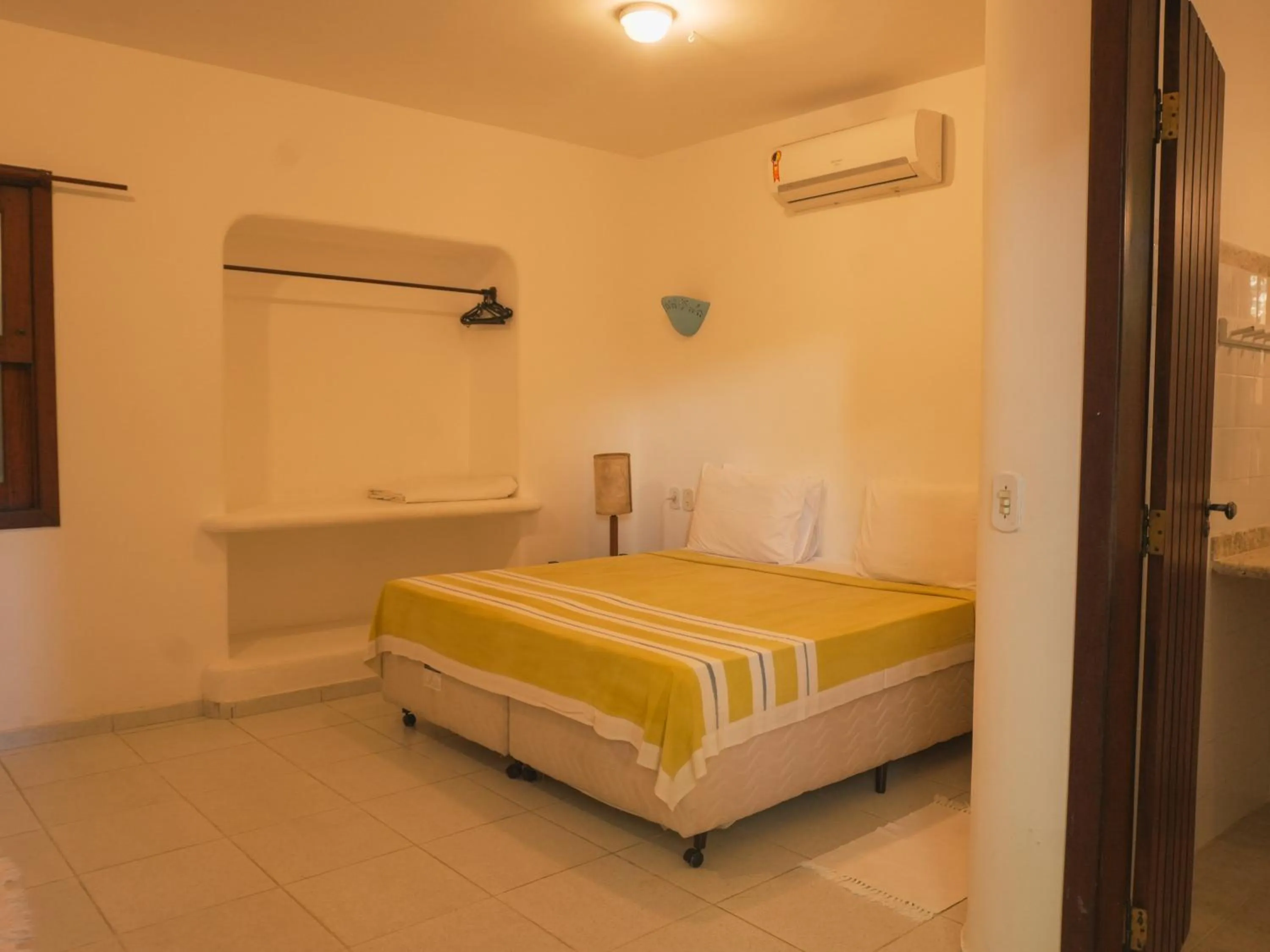 Bed in Pousada Erva Doce