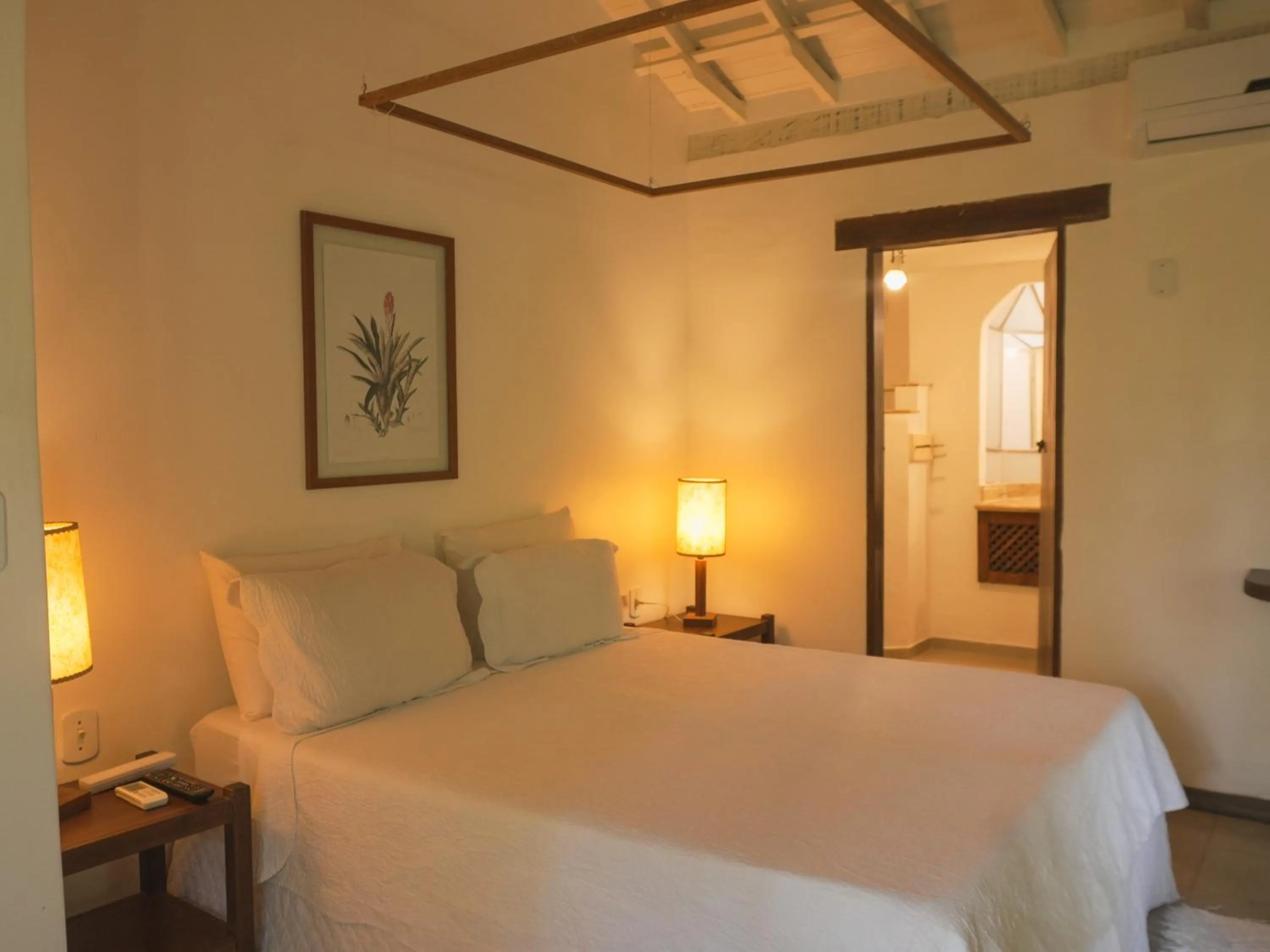 Bed in Pousada Erva Doce