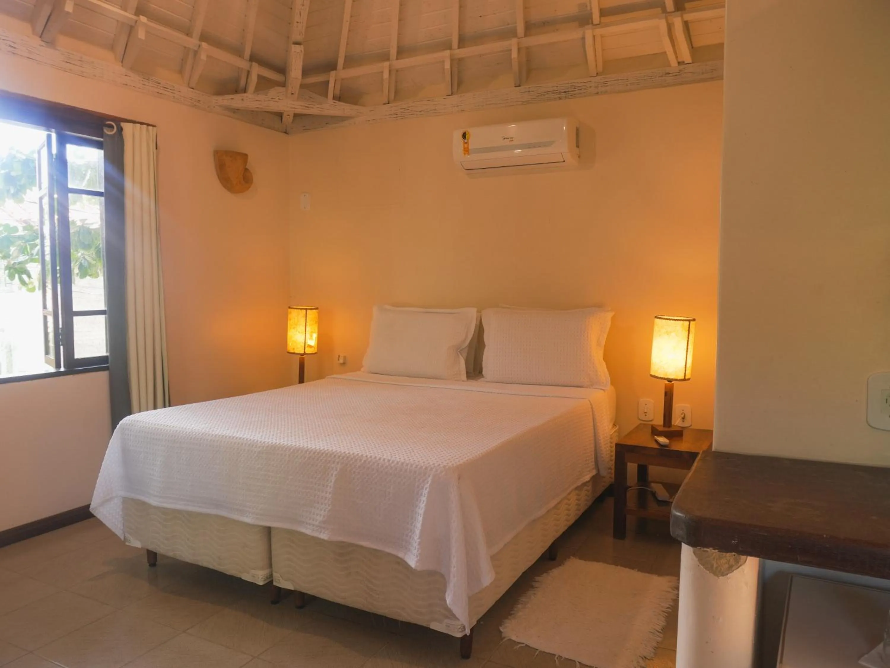 Bed in Pousada Erva Doce