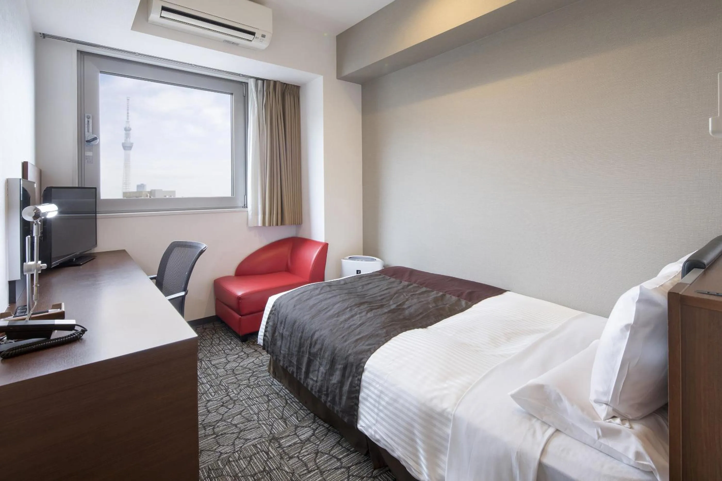 Bed in HOTEL MYSTAYS Asakusabashi