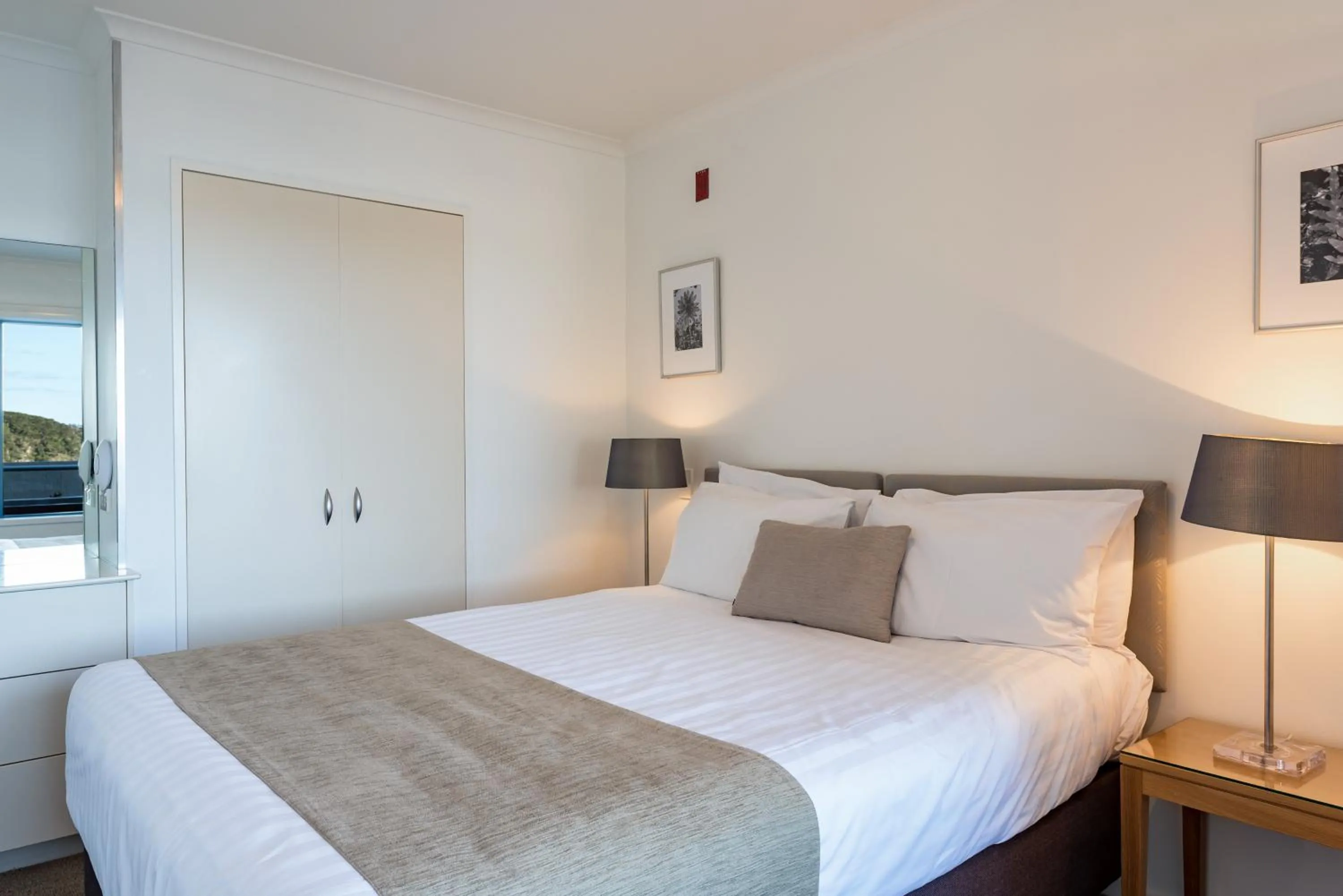 Bed in Blue Pacific Apartments