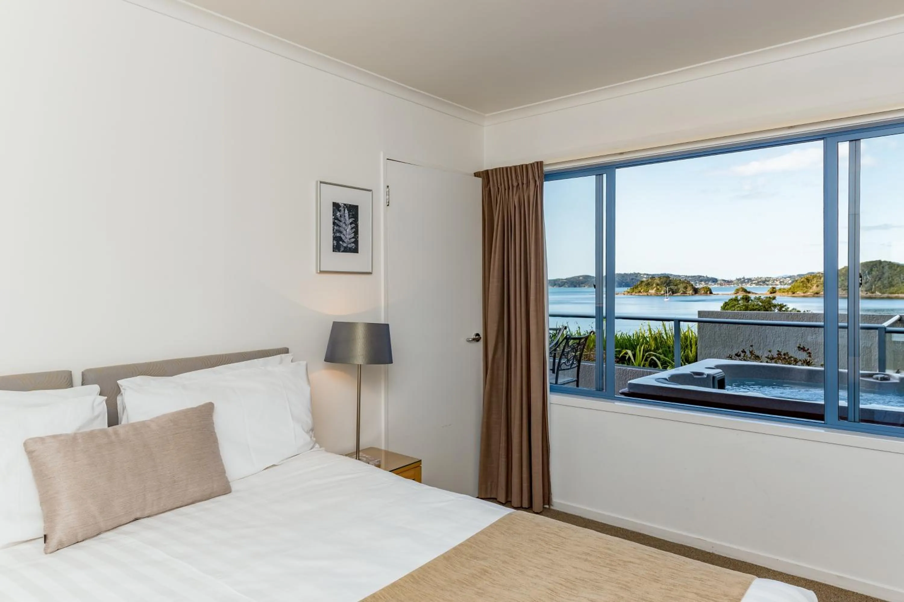 Bed in Blue Pacific Apartments