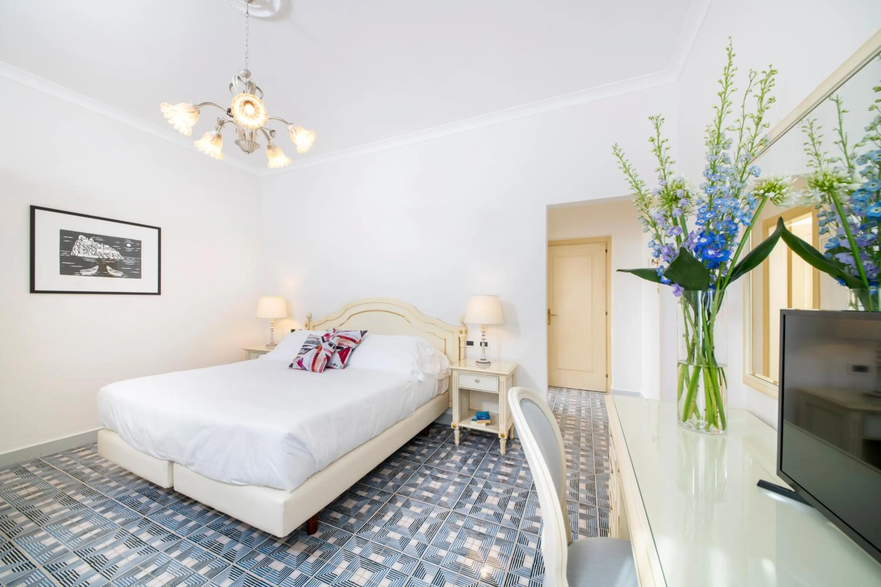 Bed in La Reginella Resort & Spa