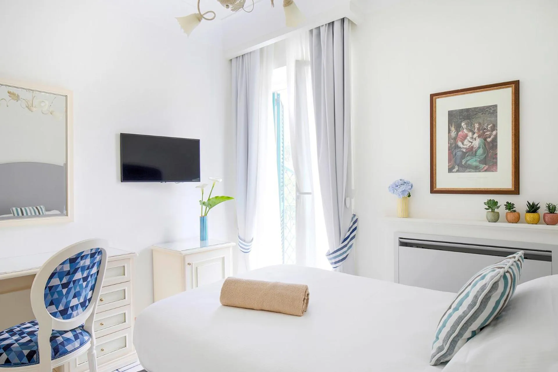 Bed in La Reginella Resort & Spa