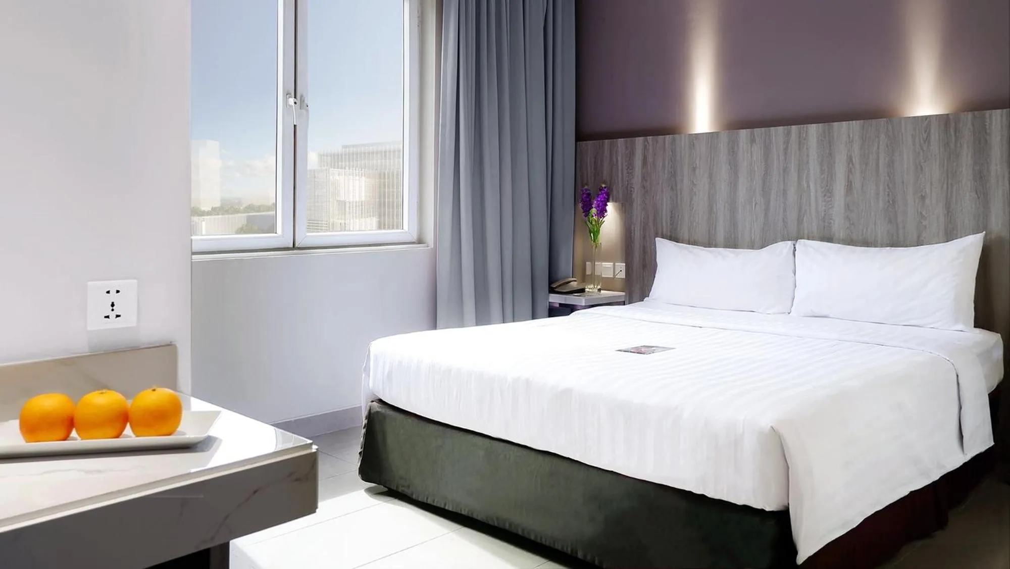 Bed in Royal Palm Hotel & Conference Center Cengkareng