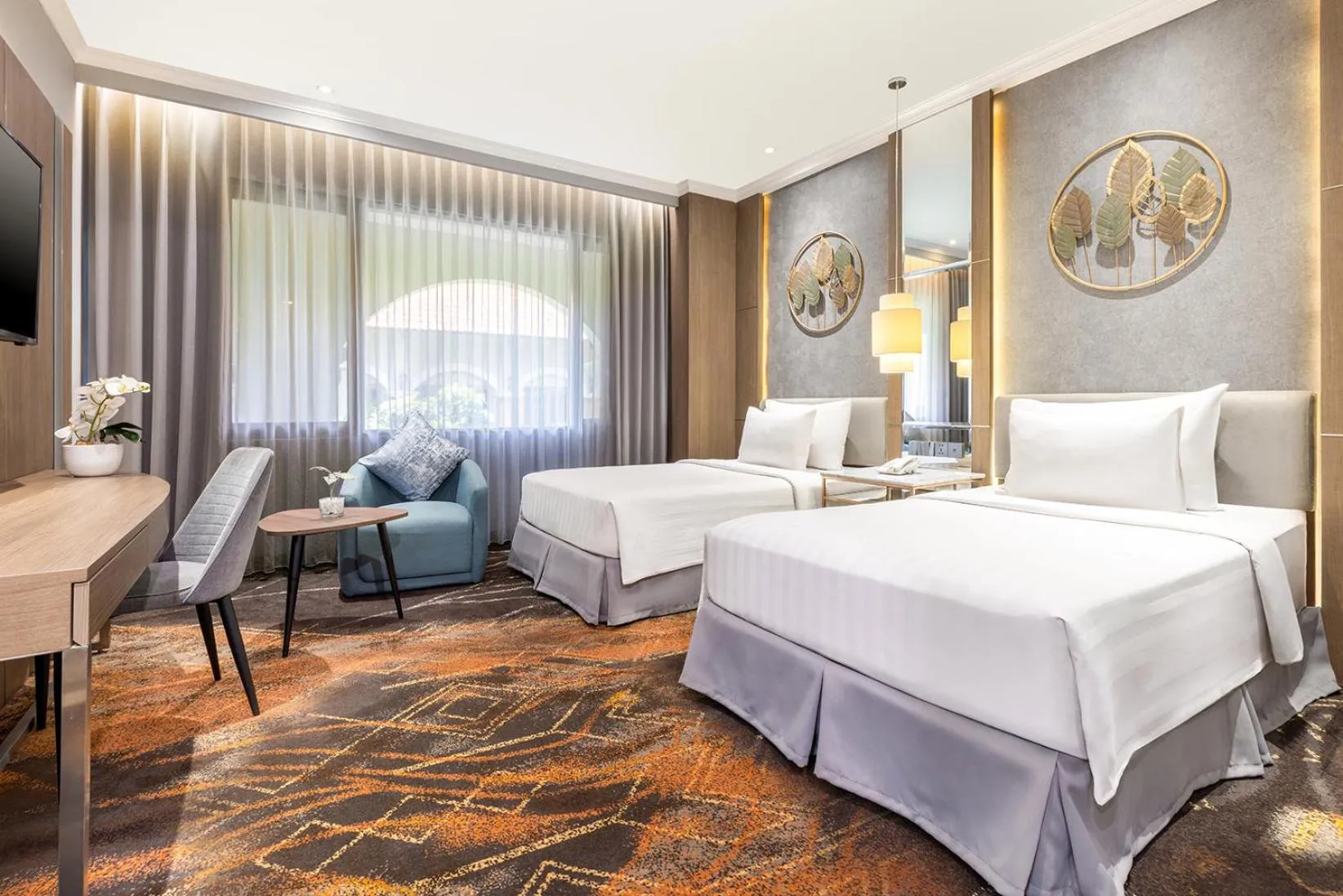 Bed in Aston Tropicana Hotel Bandung