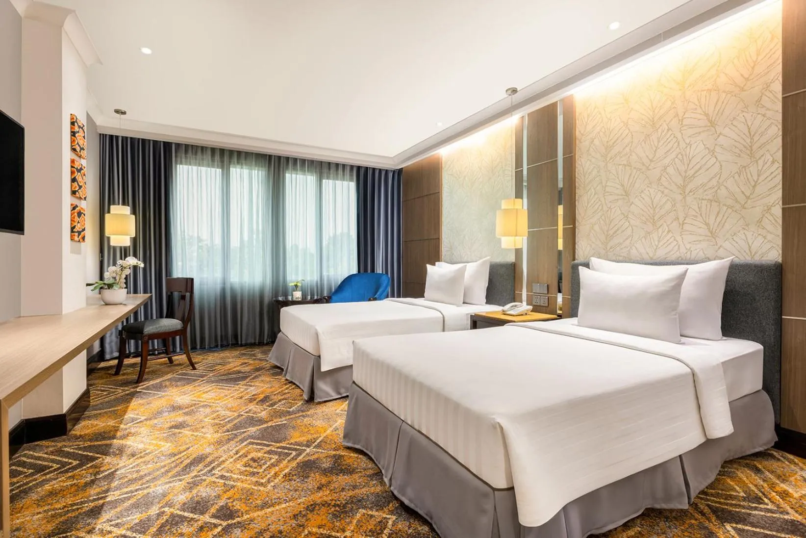 Bed in Aston Tropicana Hotel Bandung