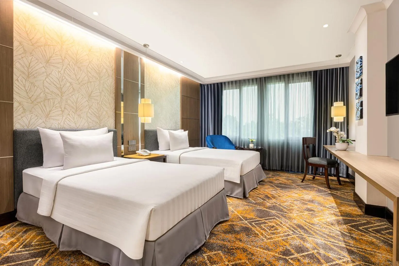 Bed in Aston Tropicana Hotel Bandung