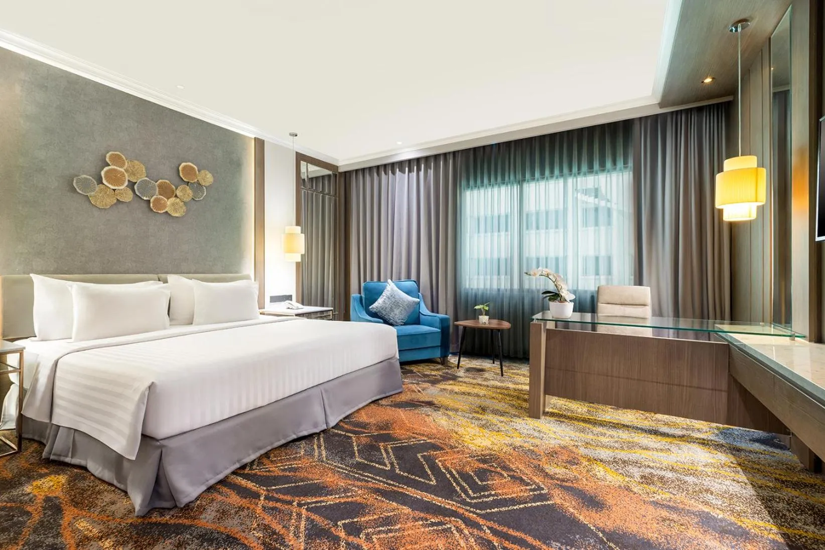 Bed in Aston Tropicana Hotel Bandung