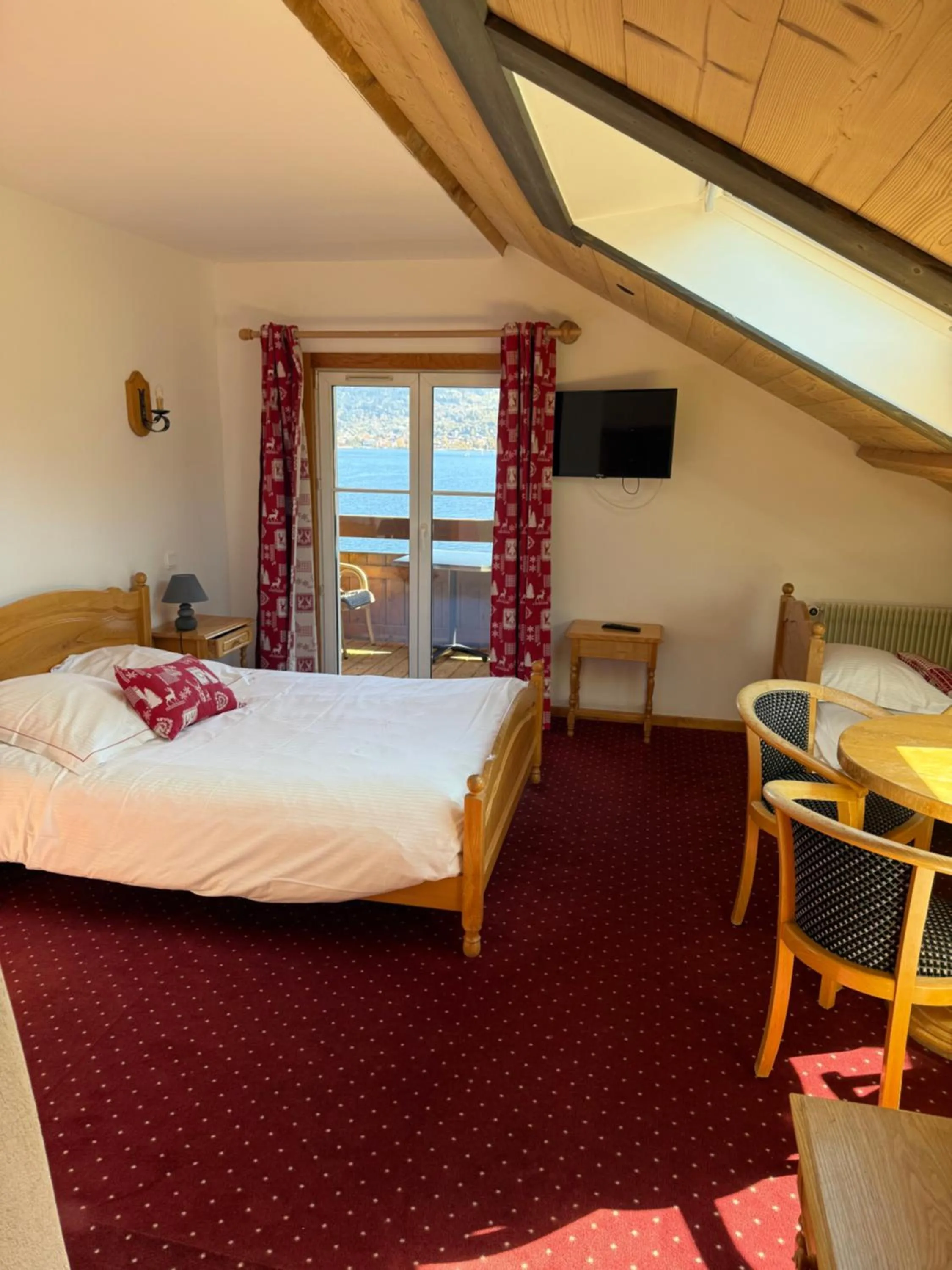 Bed in L'Auberge au Bord du Lac