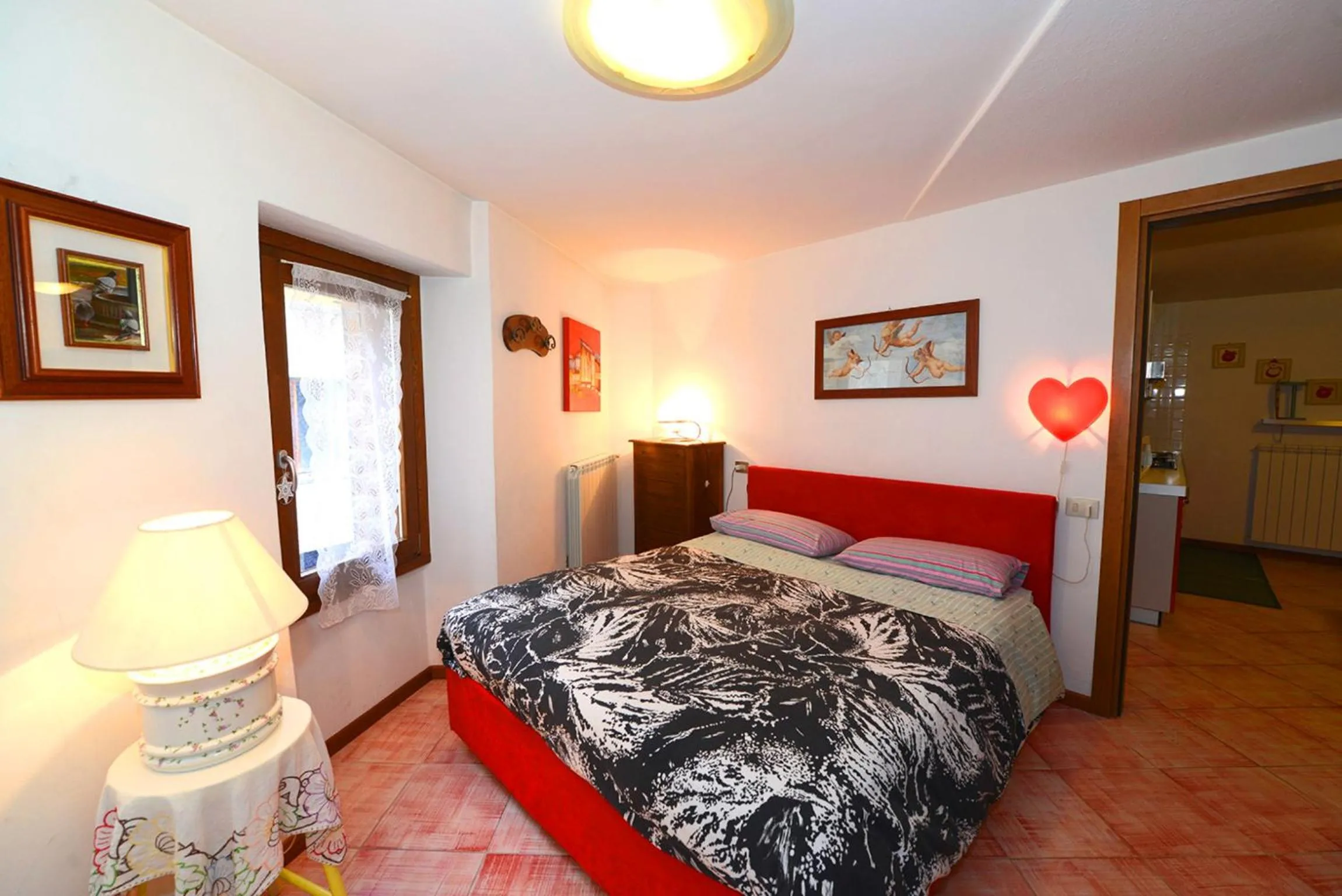Photo of the whole room, Bed in La casa del cuore