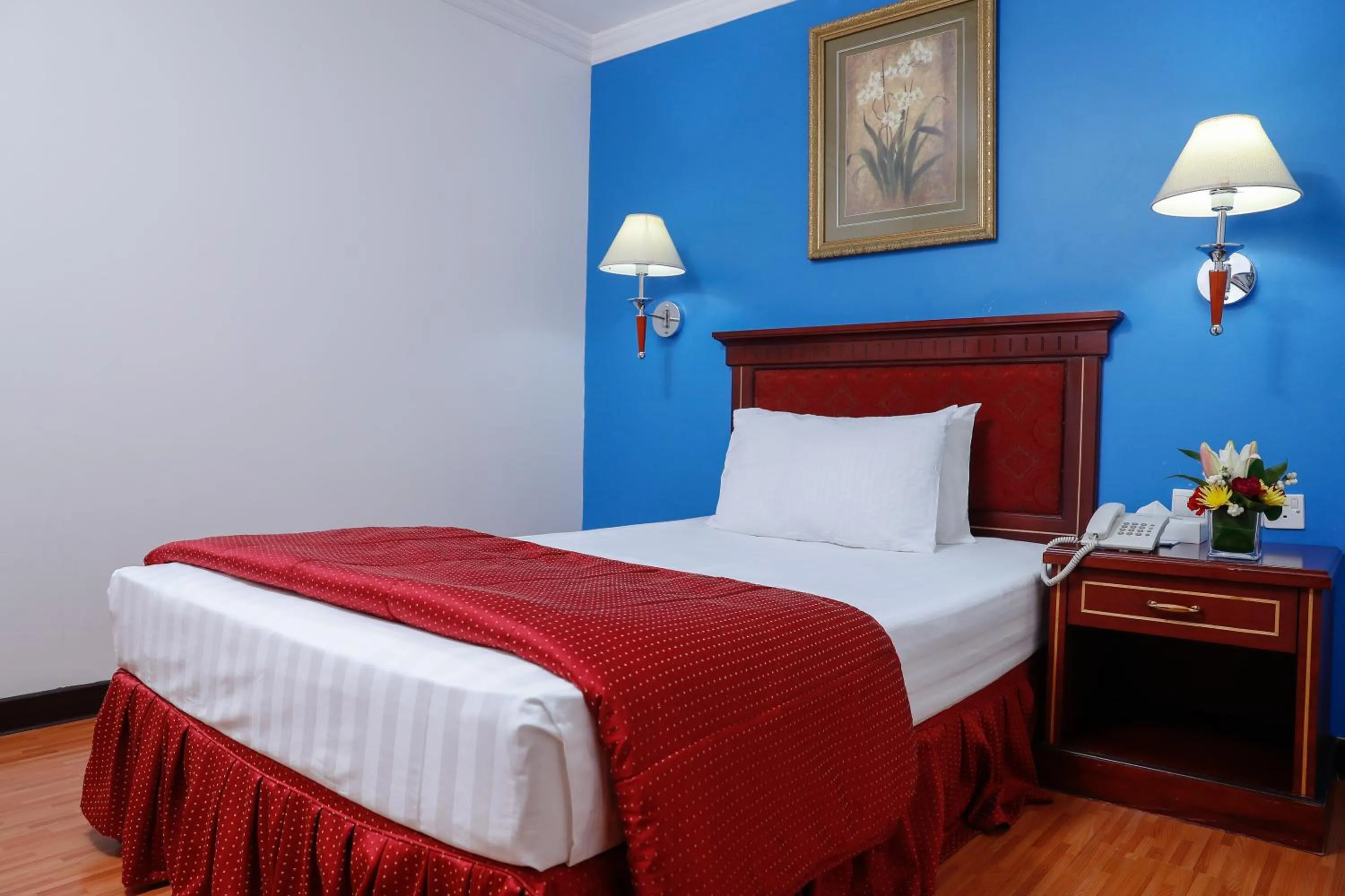 Bed in Taj Plaza Hotel