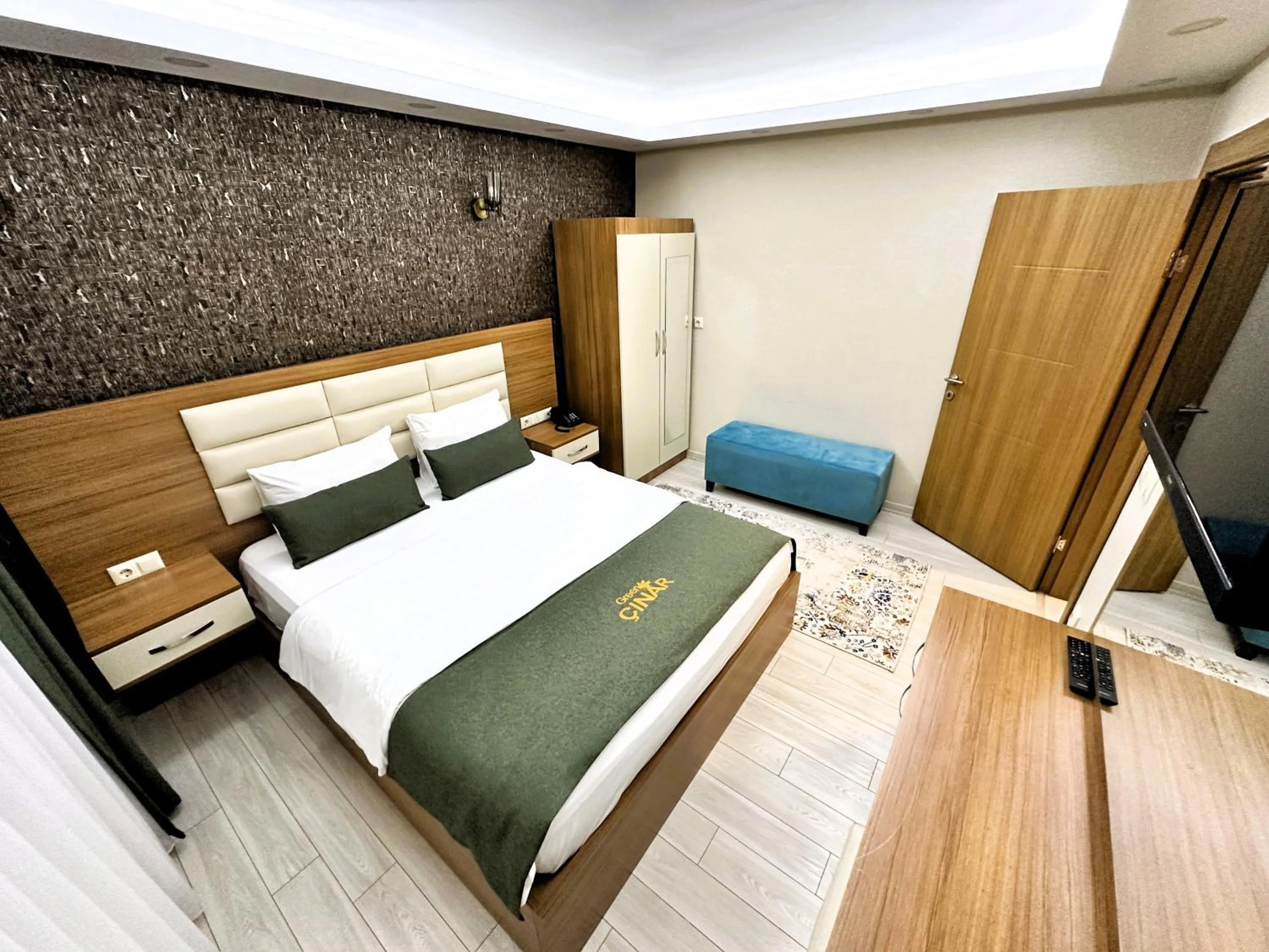 Bed in Green Cinar Apart