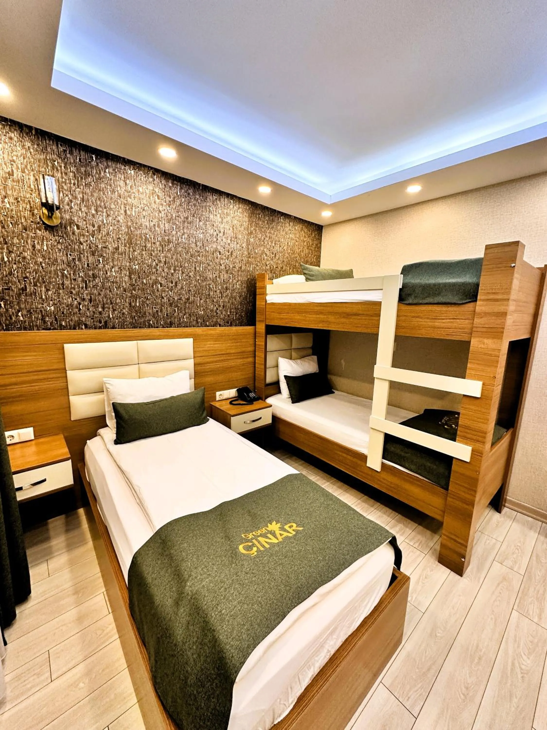 Bed in Green Cinar Apart