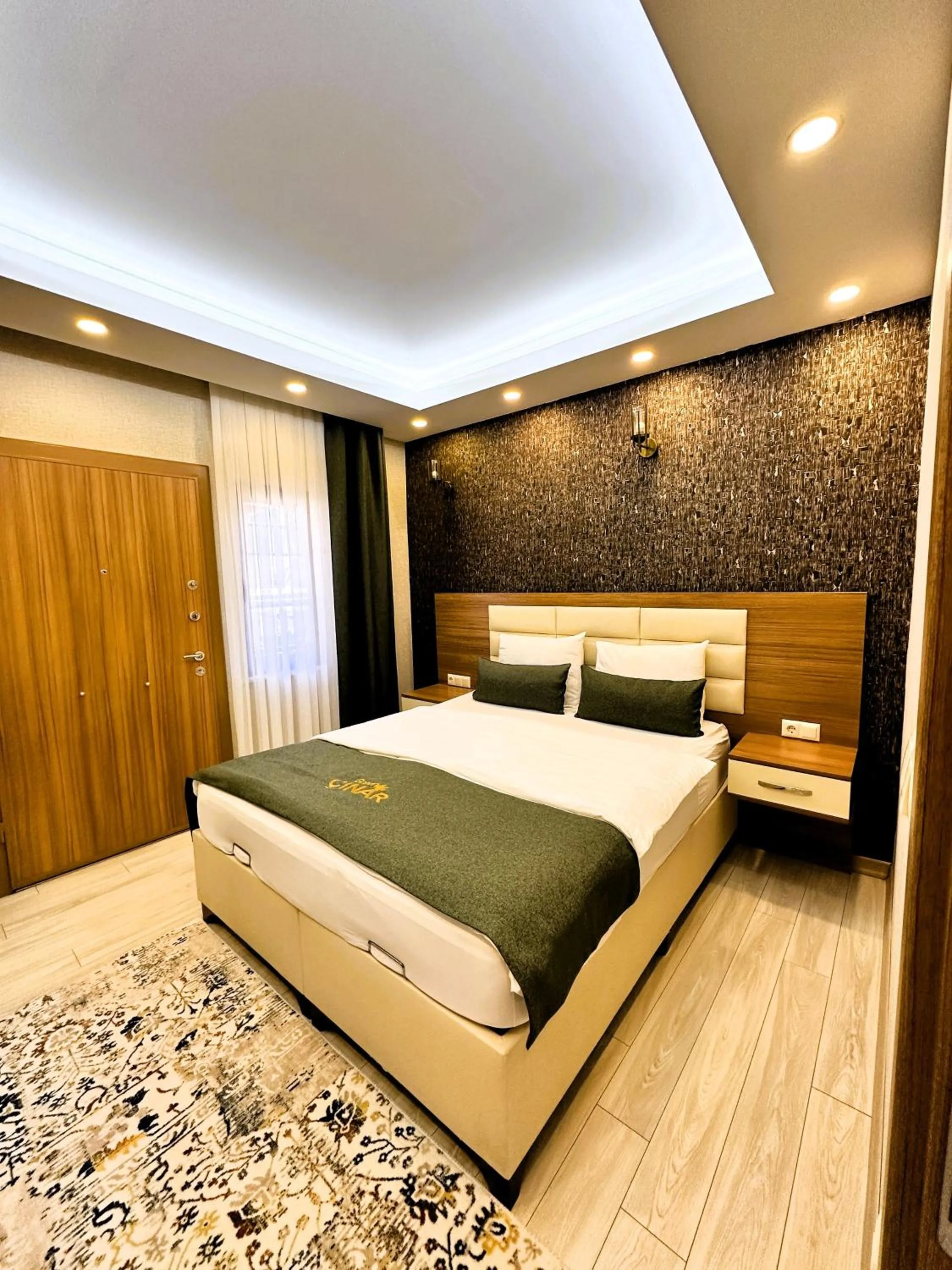 Bed in Green Cinar Apart