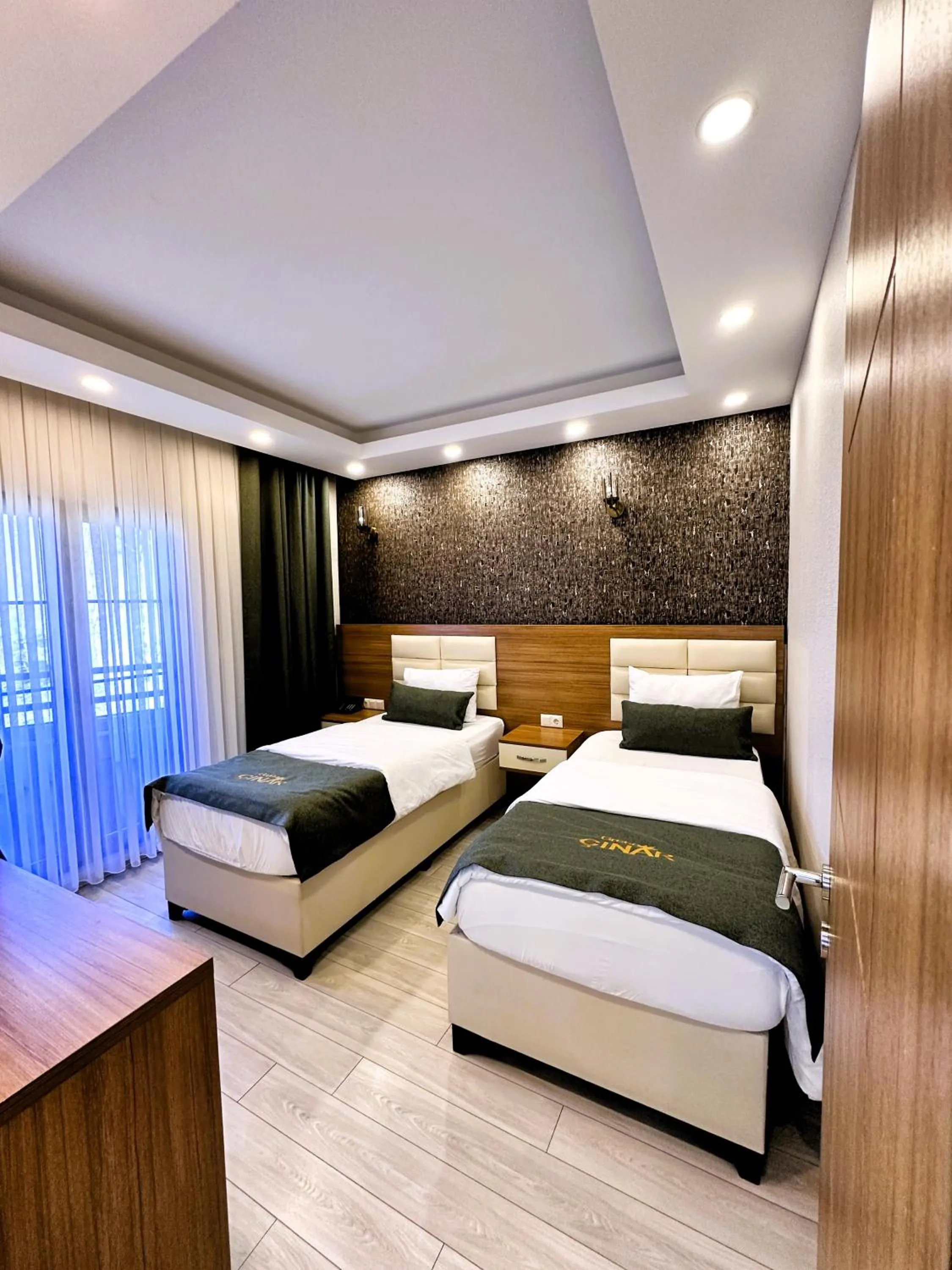 Bed in Green Cinar Apart