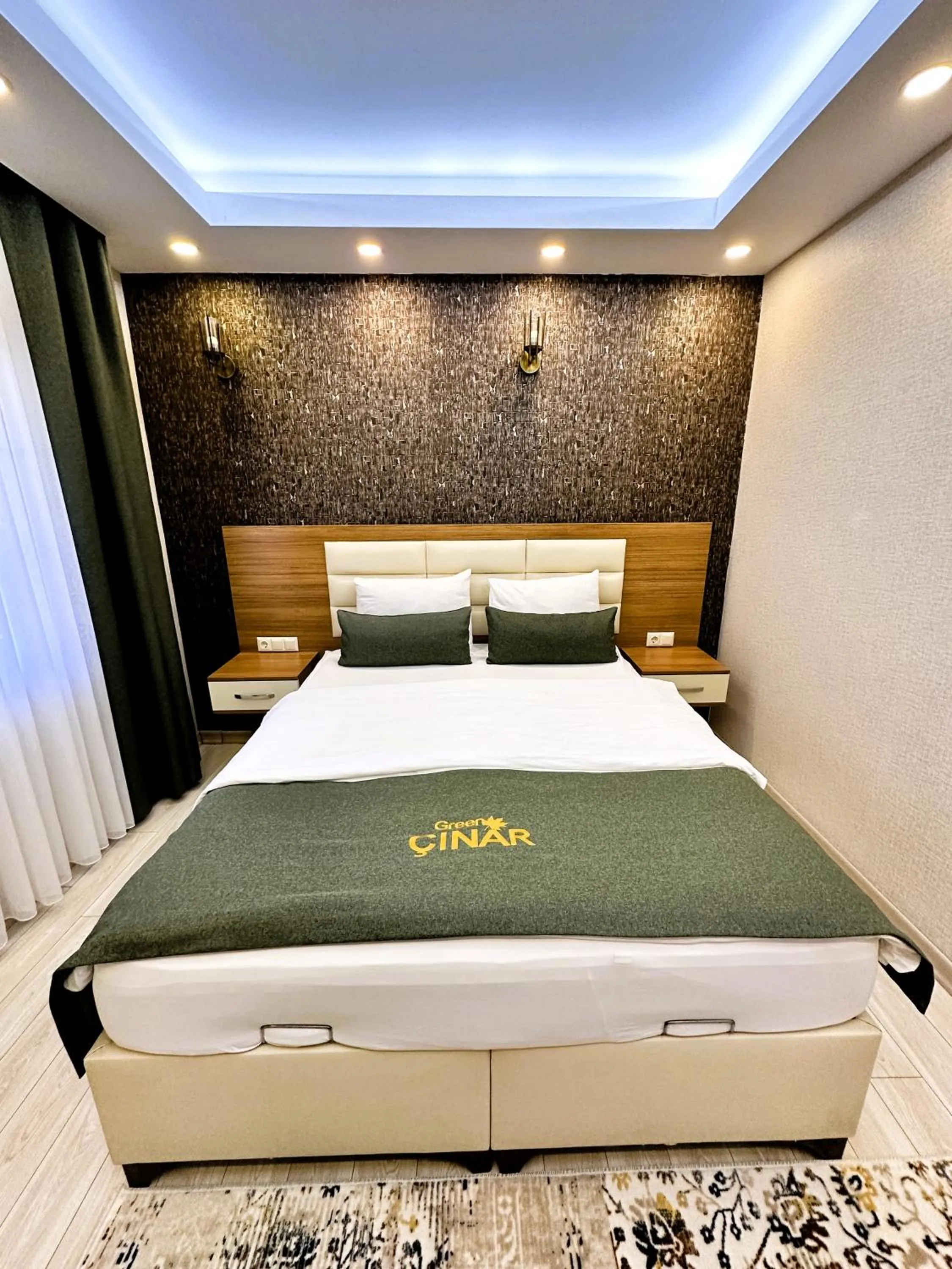 Bed in Green Cinar Apart