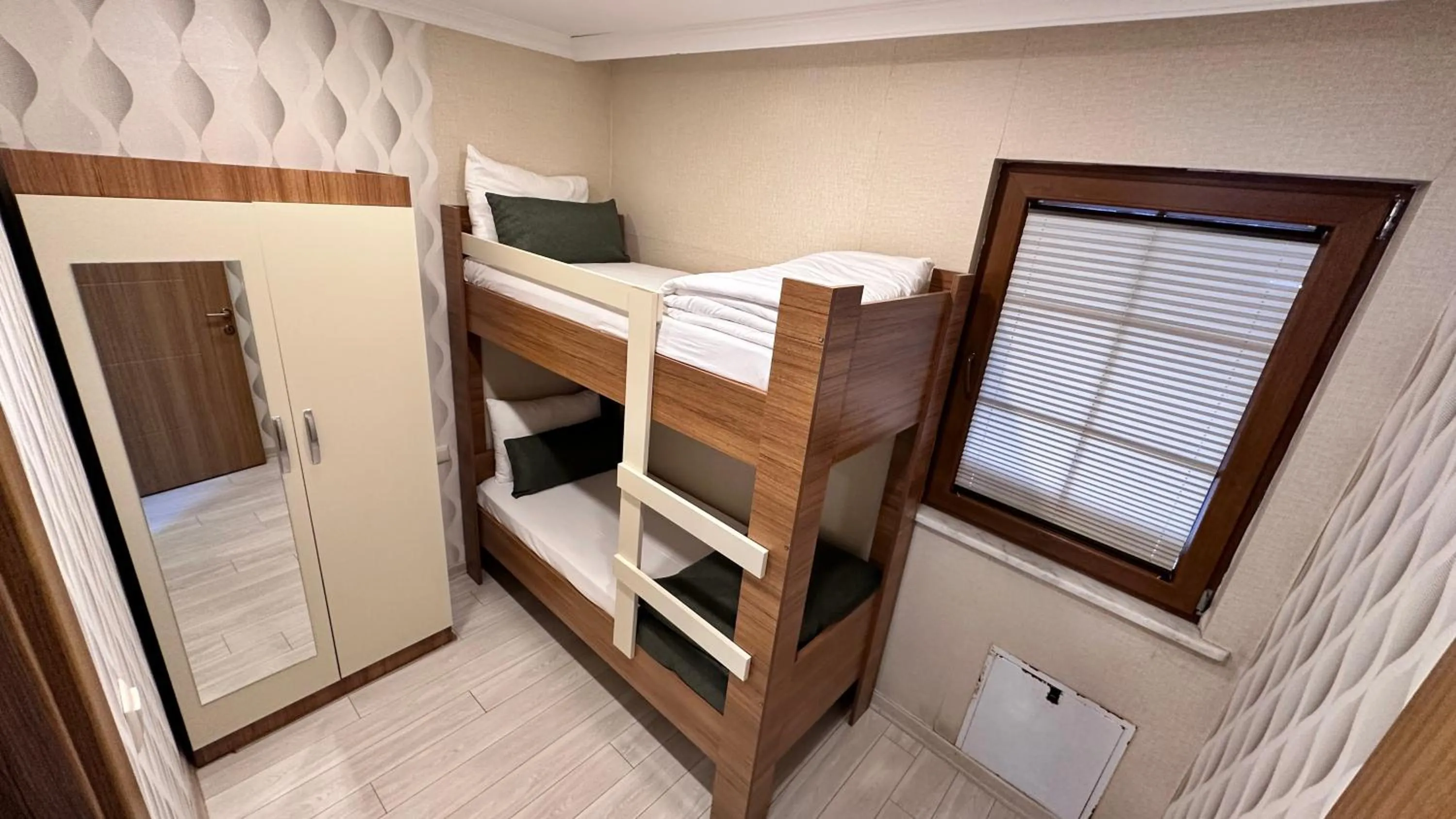 Bed in Green Cinar Apart