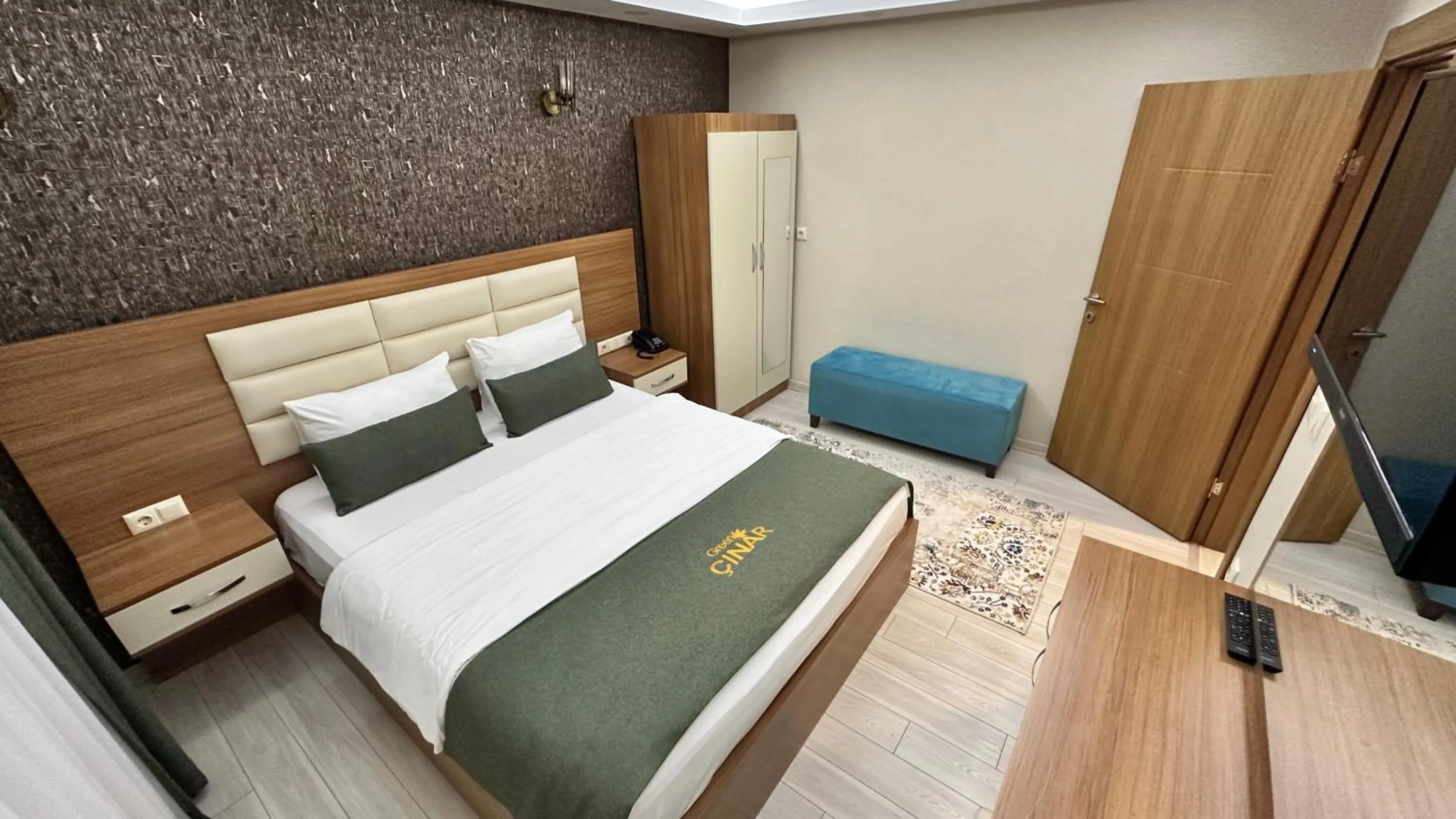 Bed in Green Cinar Apart