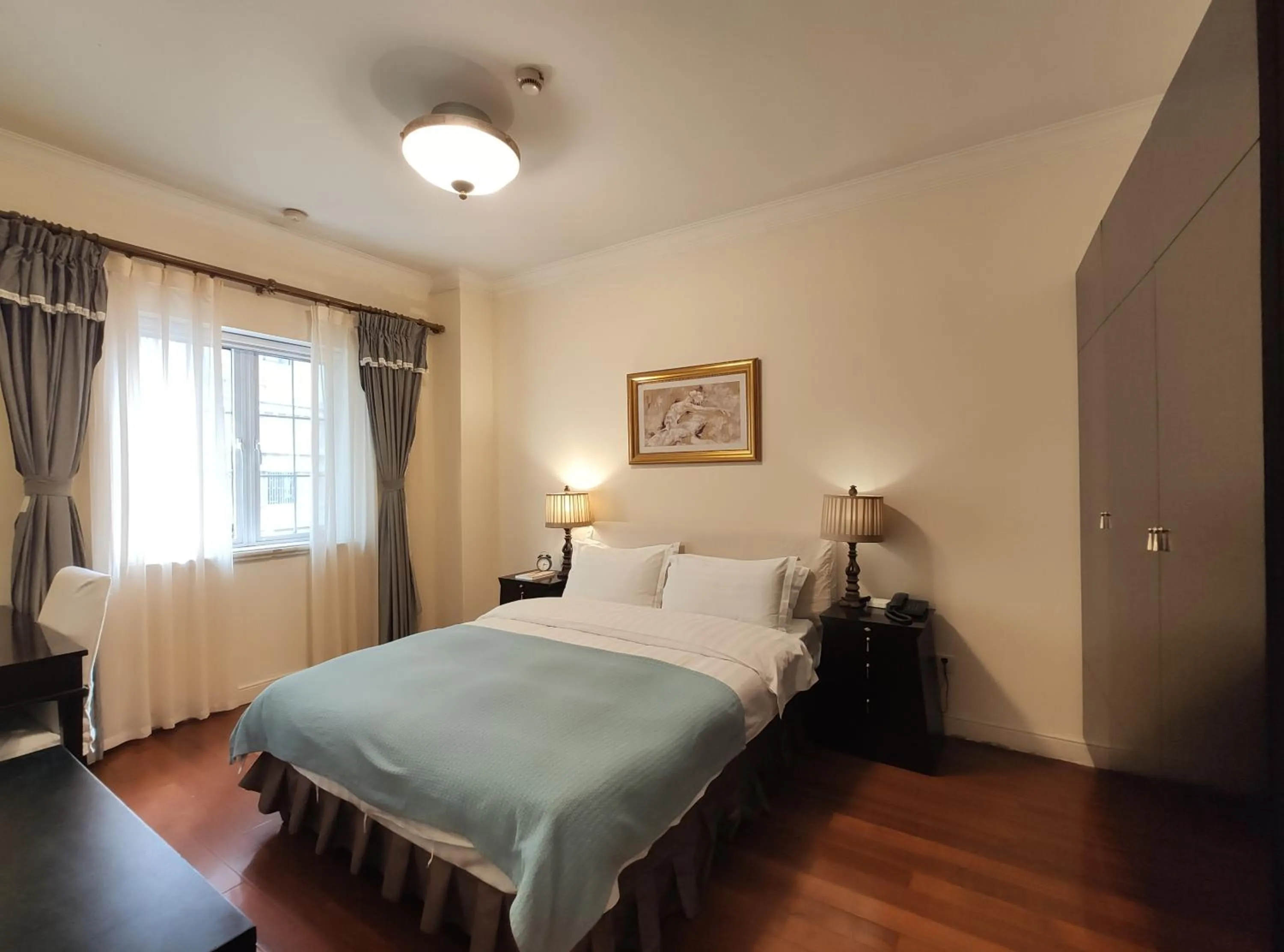 Bed in Ladoll Service Apartments