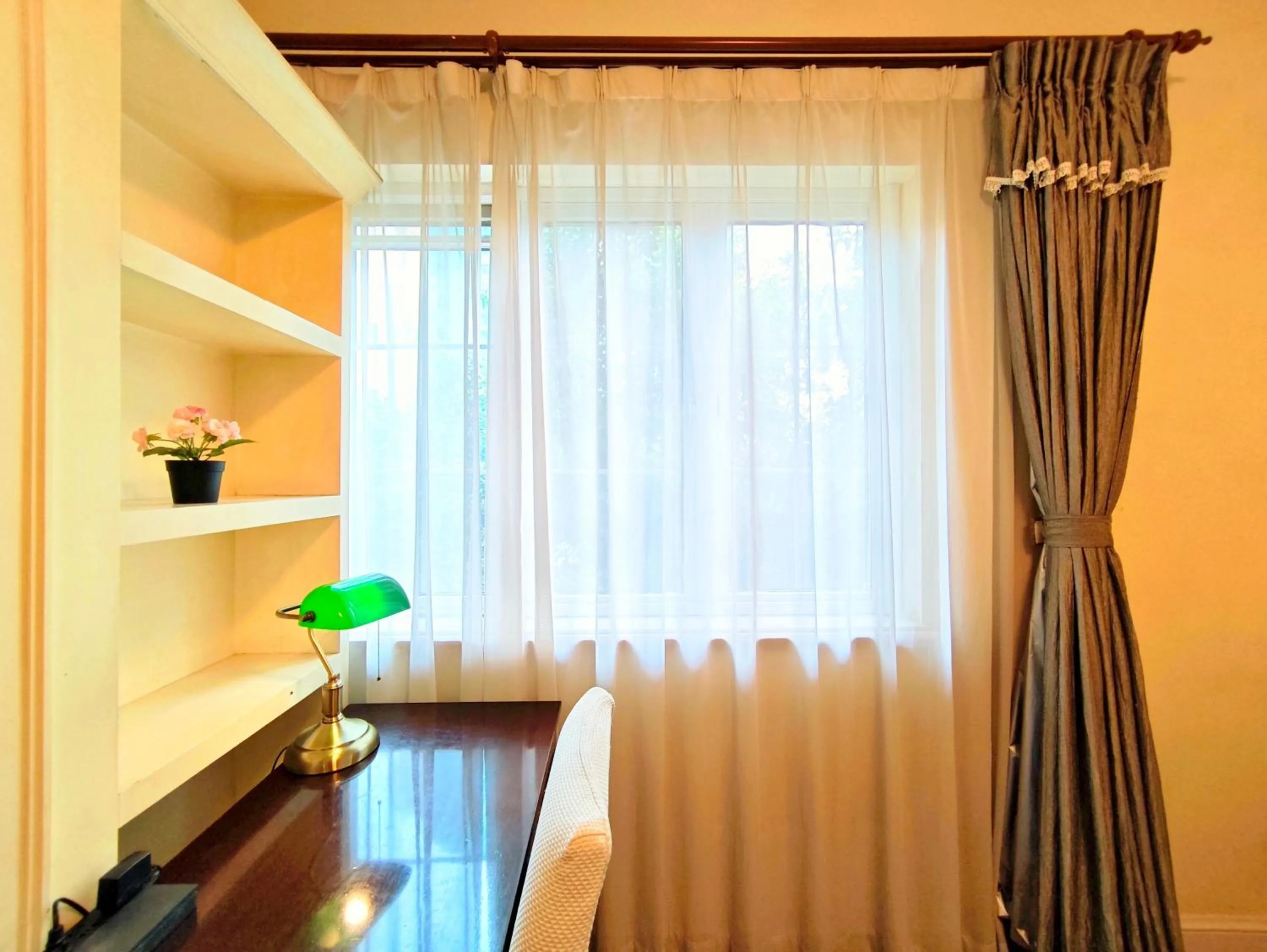 Bed in Ladoll Service Apartments