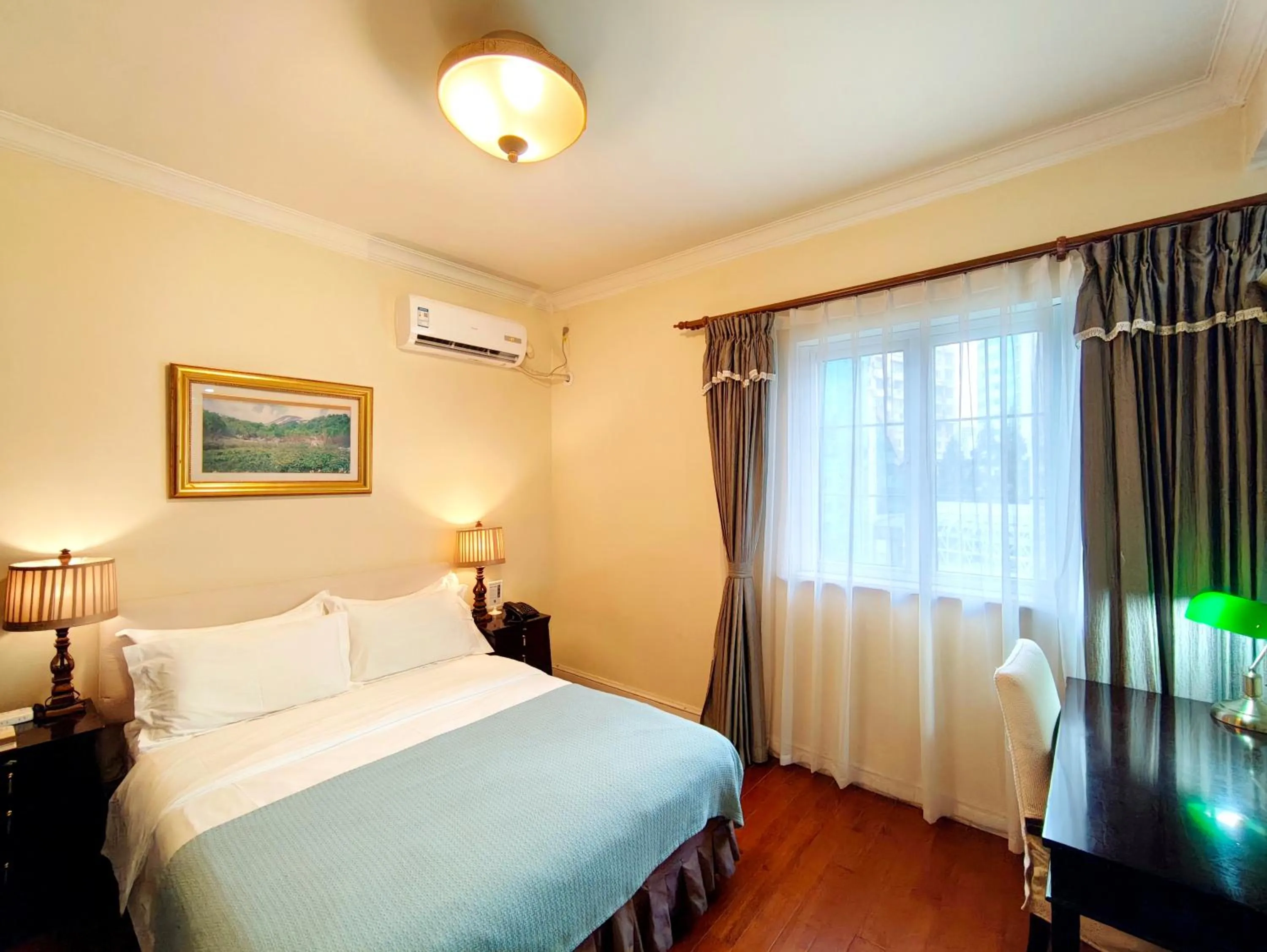 Bed in Ladoll Service Apartments