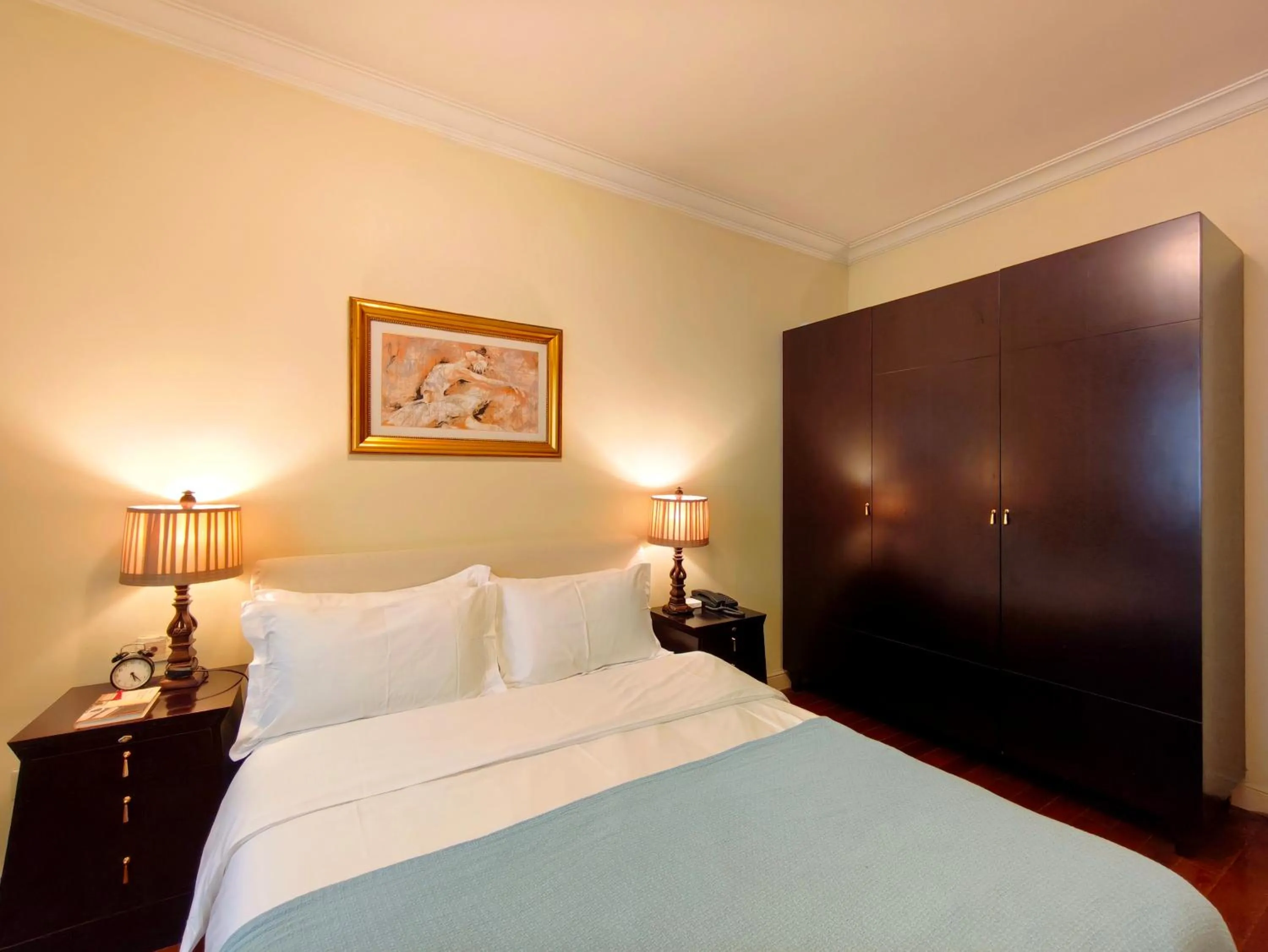 Bed in Ladoll Service Apartments