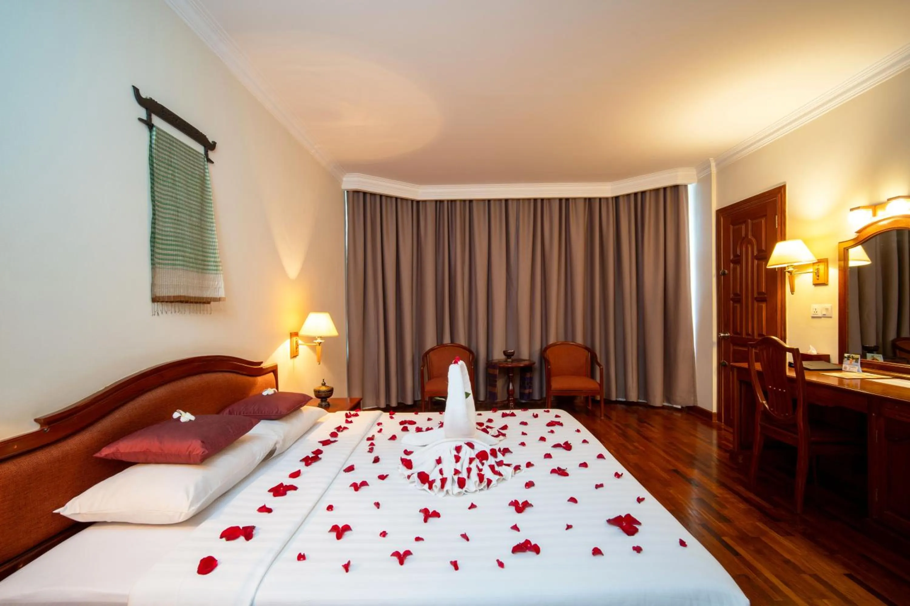 Bed in Khemara Angkor Hotel & Spa