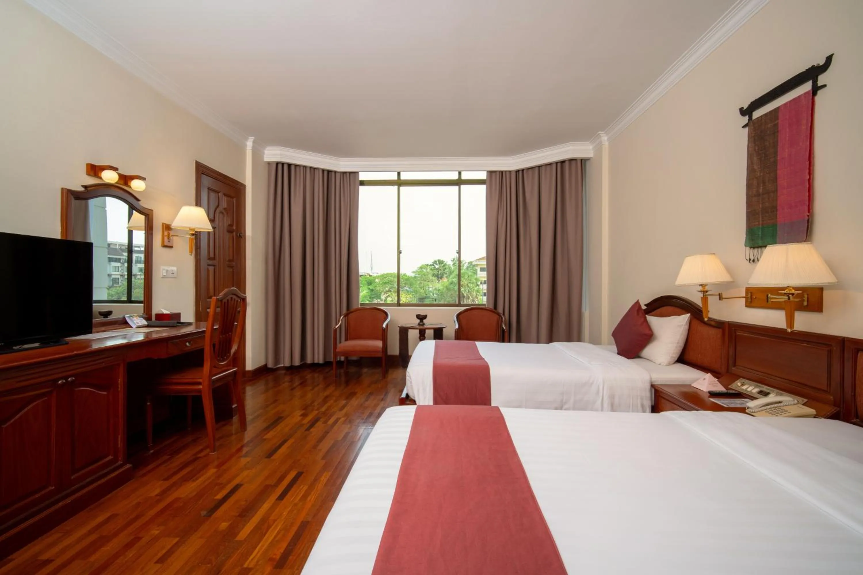 Communal lounge/ TV room, Bed in Khemara Angkor Hotel & Spa