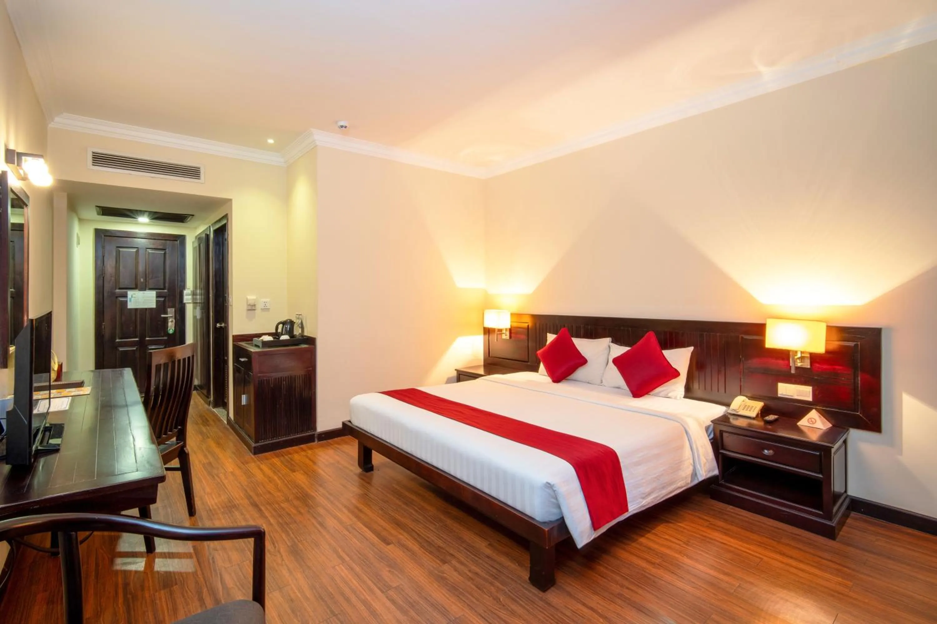 Bed in Khemara Angkor Hotel & Spa