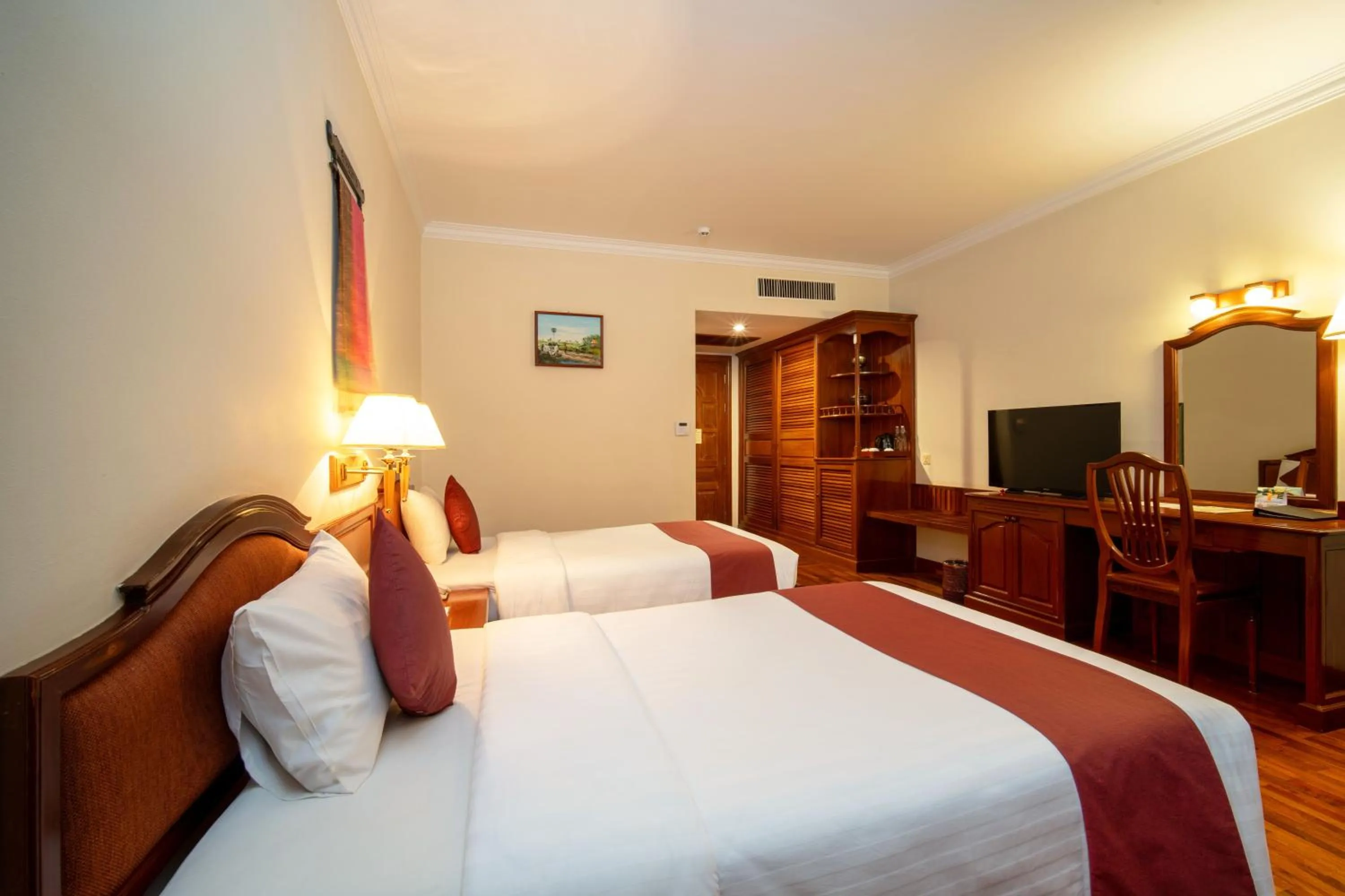 Communal lounge/ TV room, Bed in Khemara Angkor Hotel & Spa