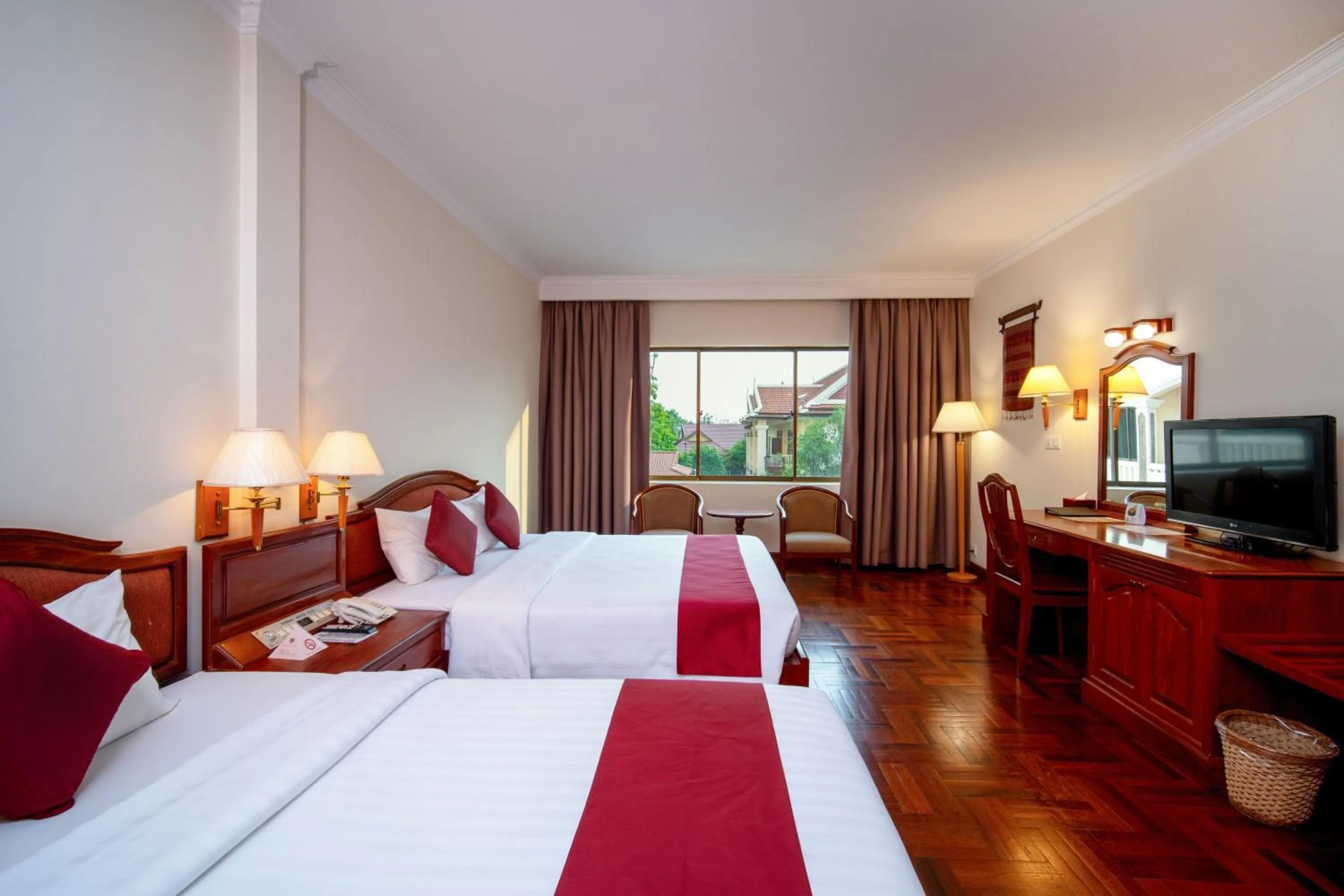 Communal lounge/ TV room, Bed in Khemara Angkor Hotel & Spa