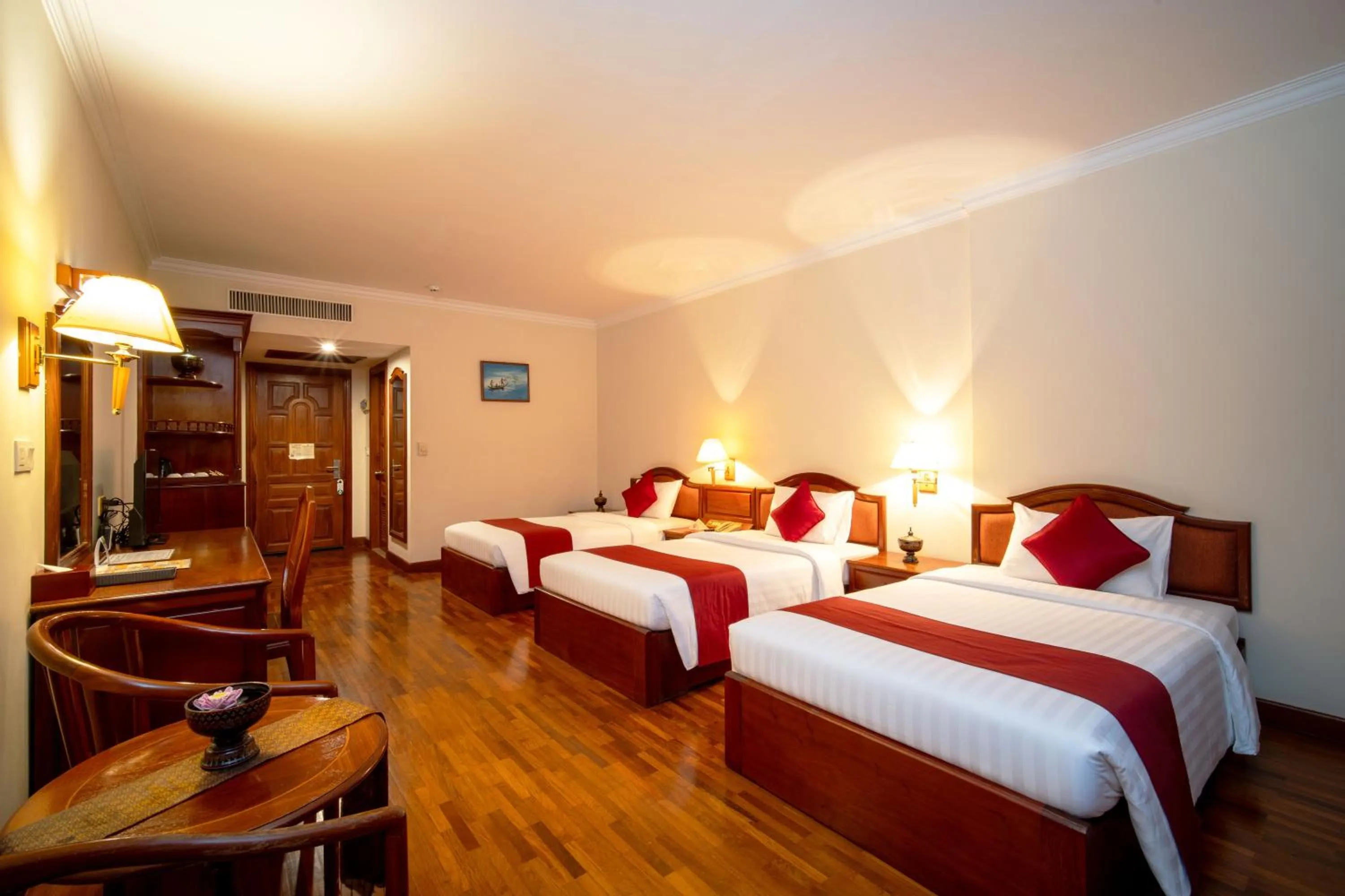 Bed in Khemara Angkor Hotel & Spa