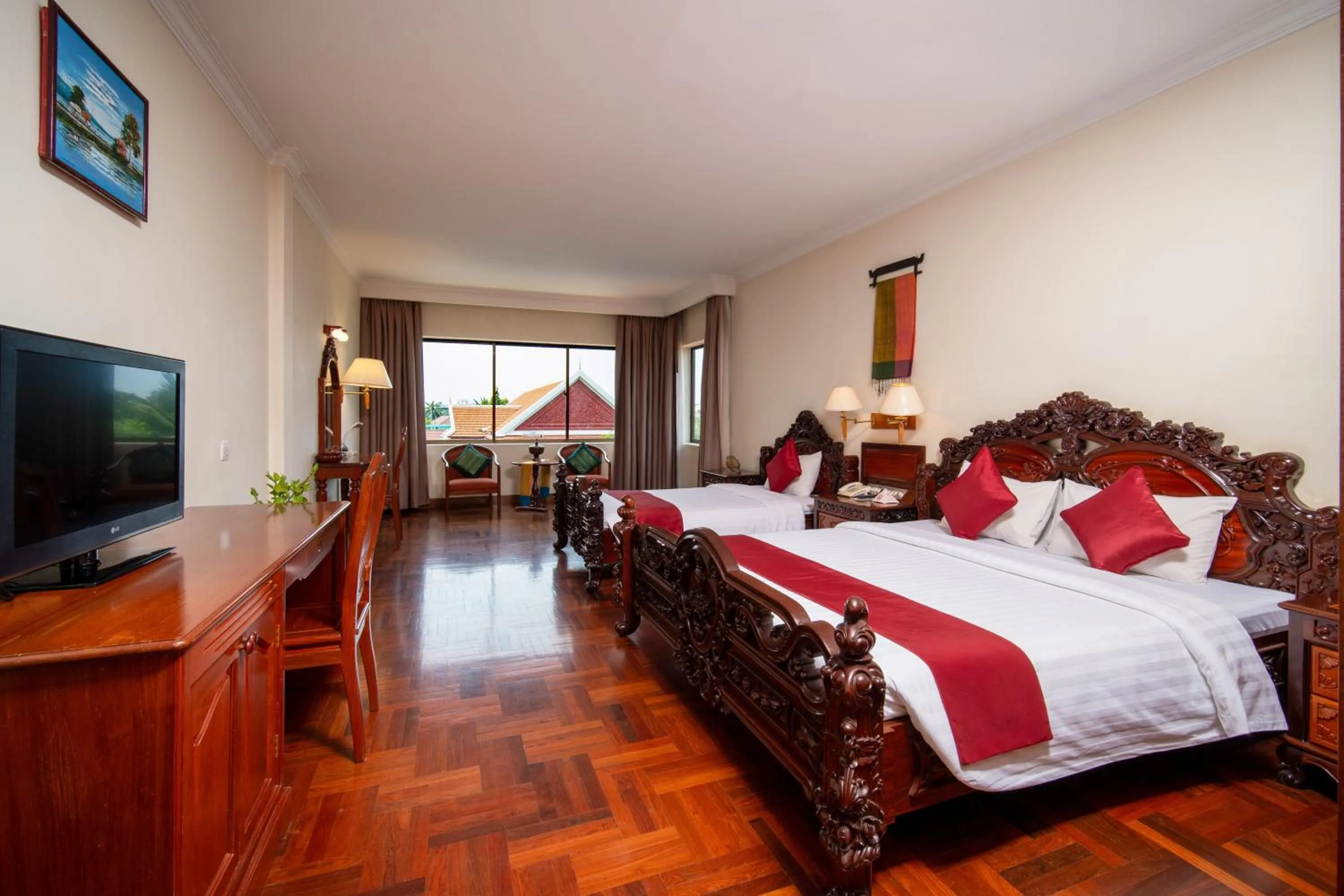 Communal lounge/ TV room, Bed in Khemara Angkor Hotel & Spa