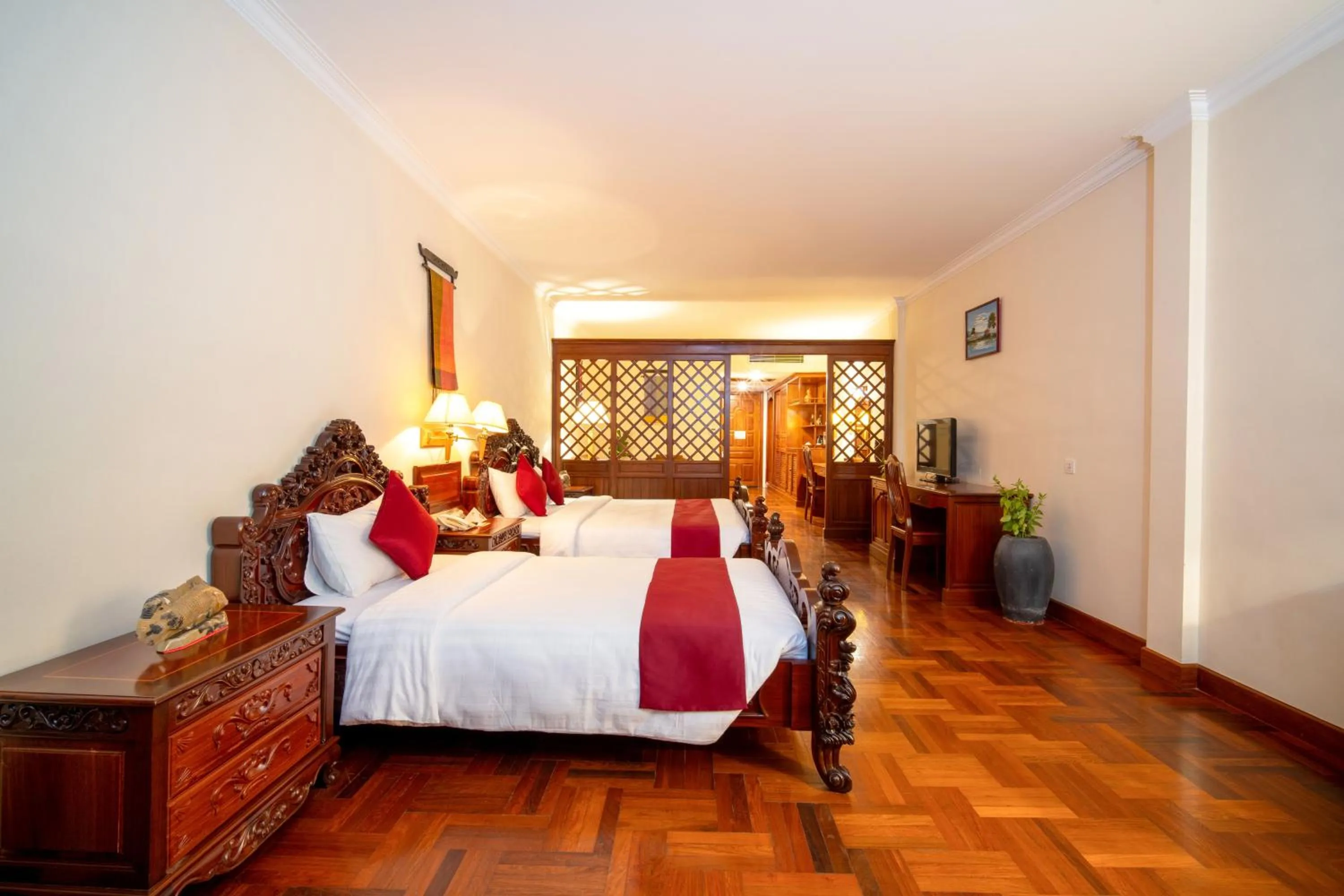 Bed in Khemara Angkor Hotel & Spa