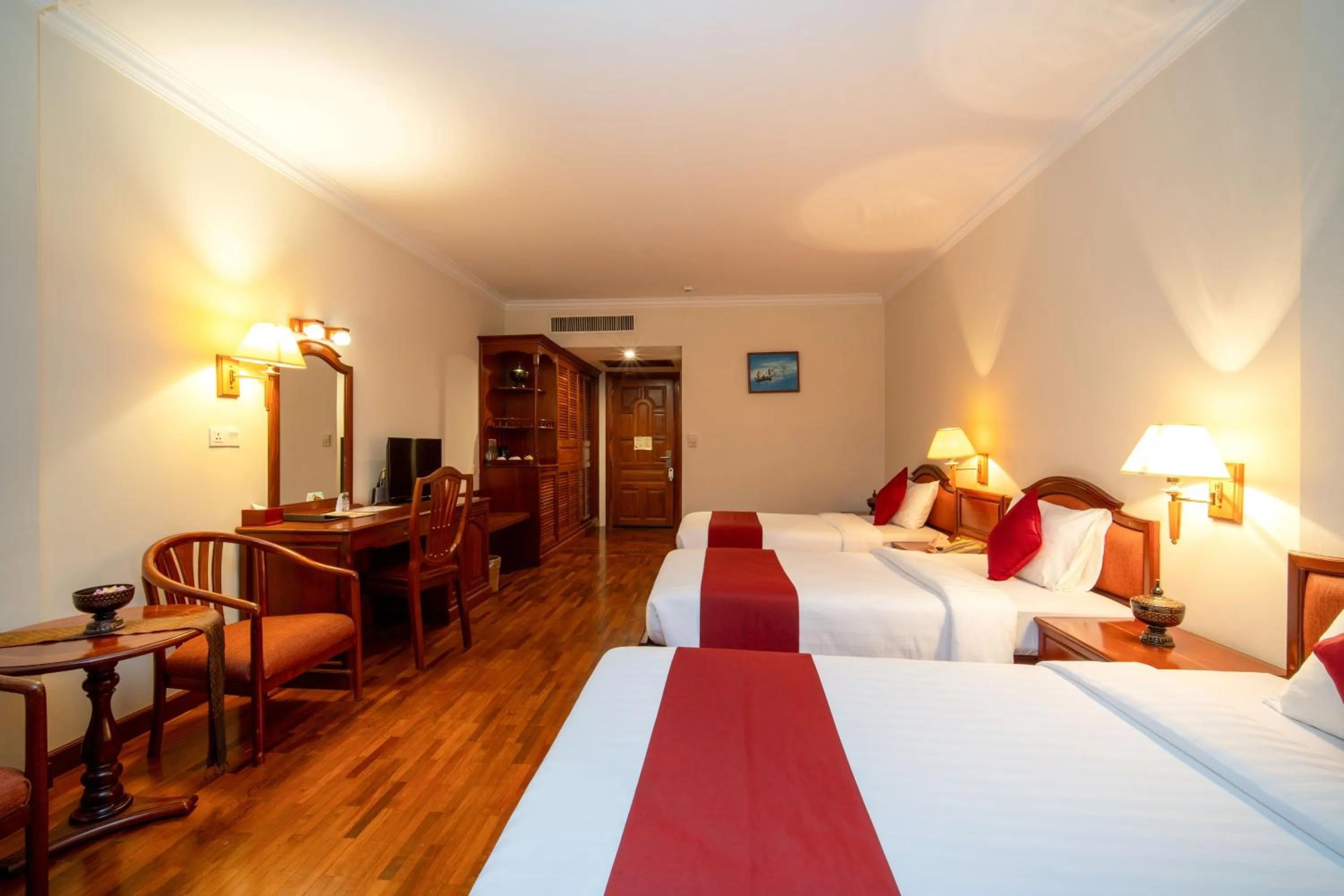 Bed in Khemara Angkor Hotel & Spa