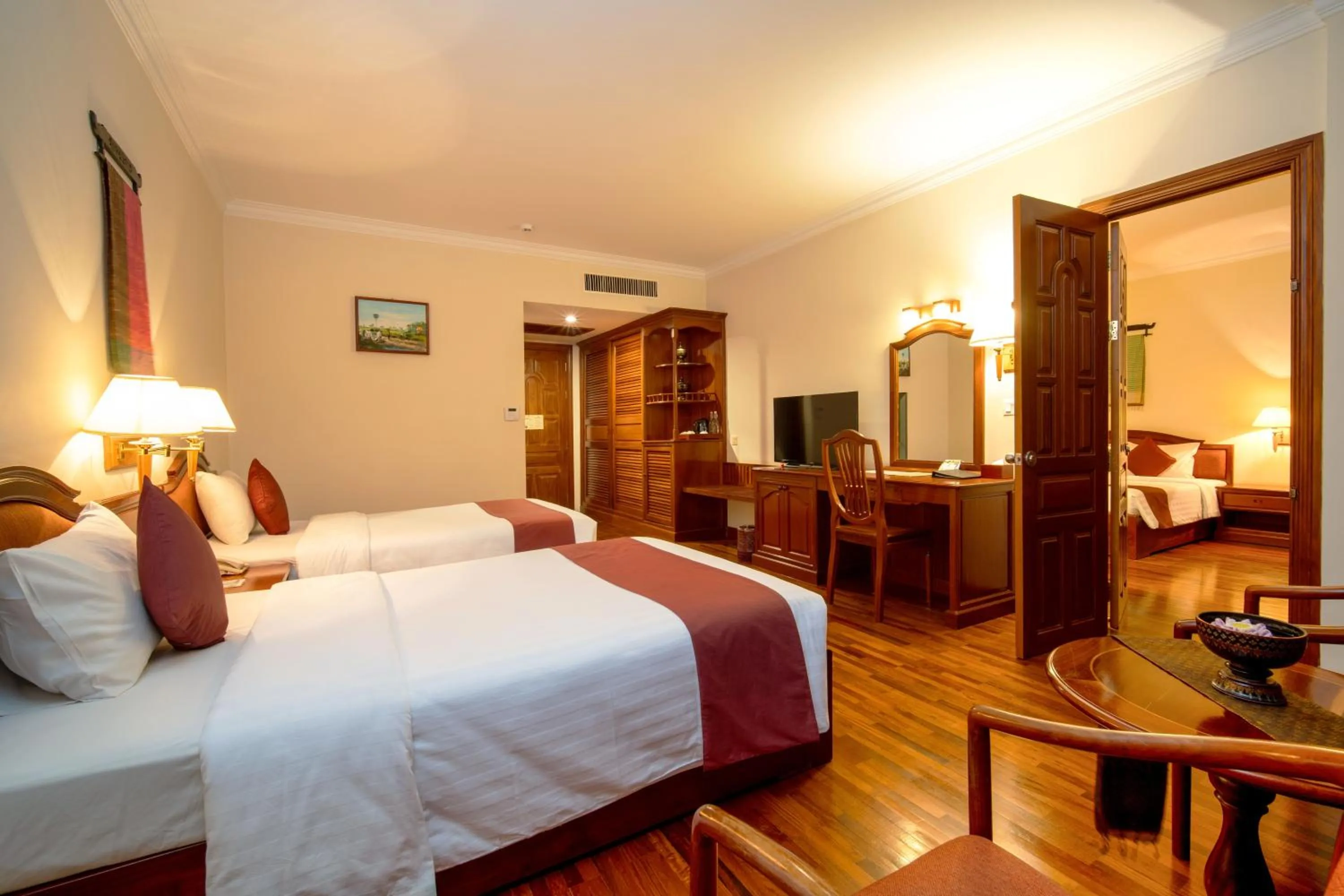 Communal lounge/ TV room, Bed in Khemara Angkor Hotel & Spa