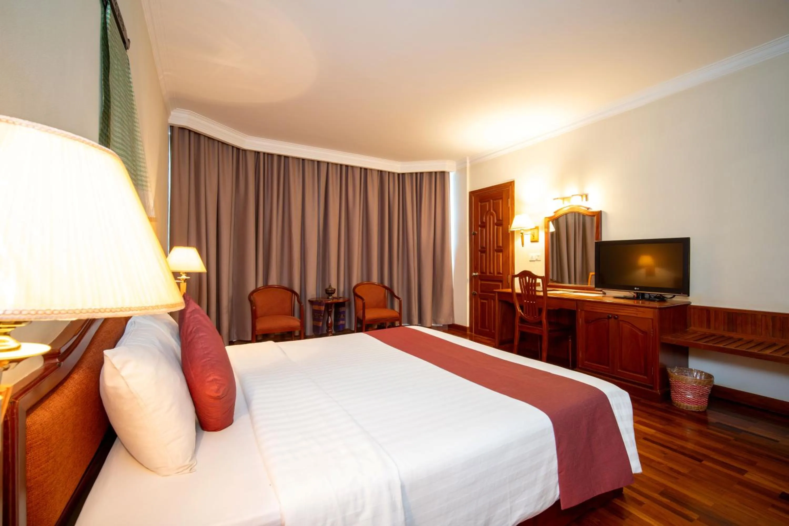 Communal lounge/ TV room, Bed in Khemara Angkor Hotel & Spa