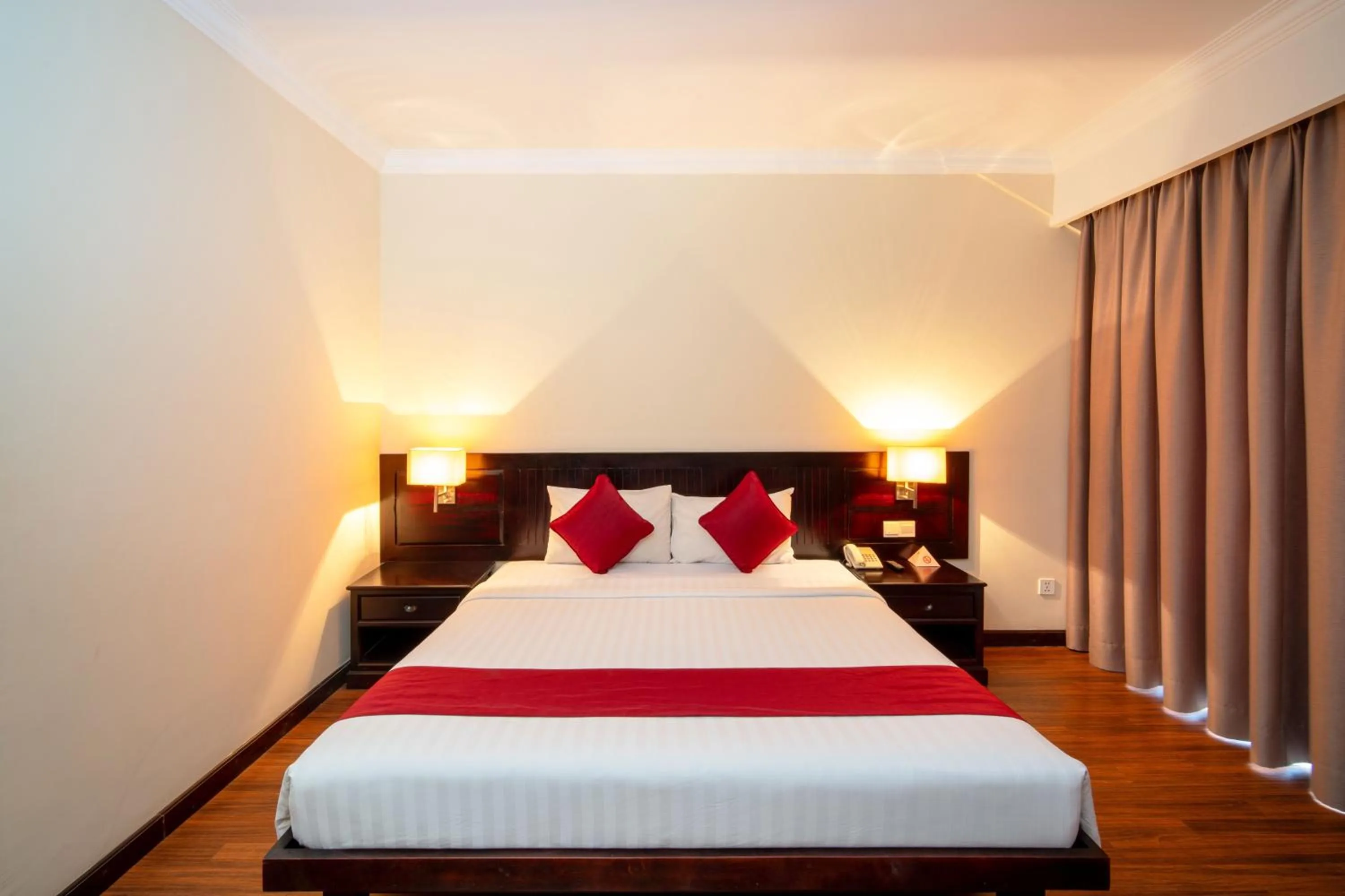 Bed in Khemara Angkor Hotel & Spa