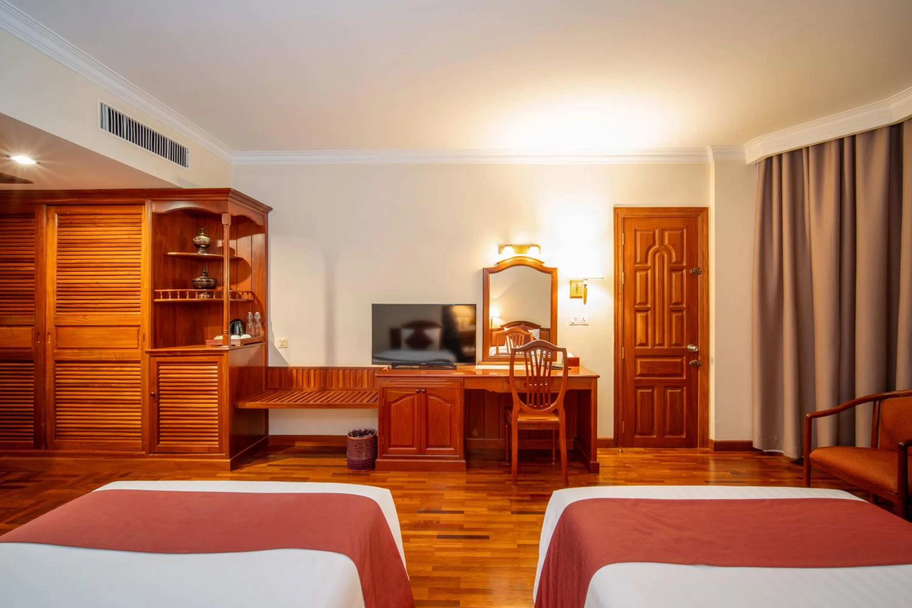 Communal lounge/ TV room, Bed in Khemara Angkor Hotel & Spa