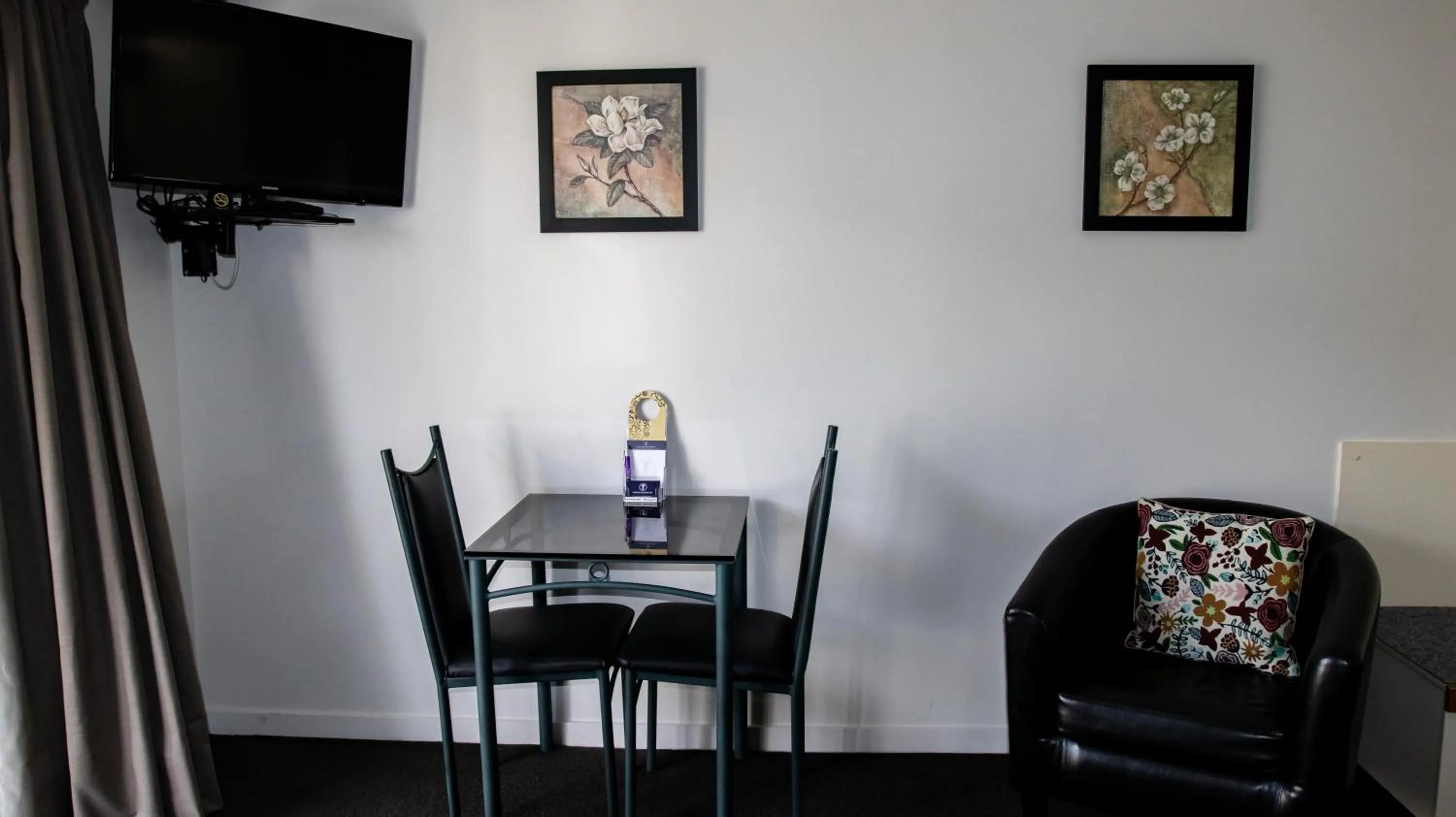 Seating area in ASURE Phoenix Motor Inn