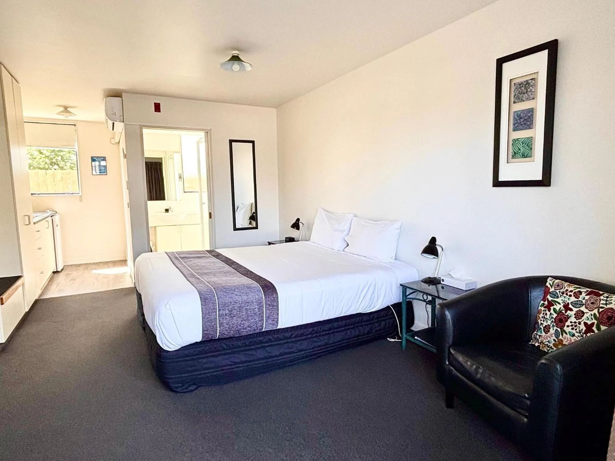 Bed in ASURE Phoenix Motor Inn