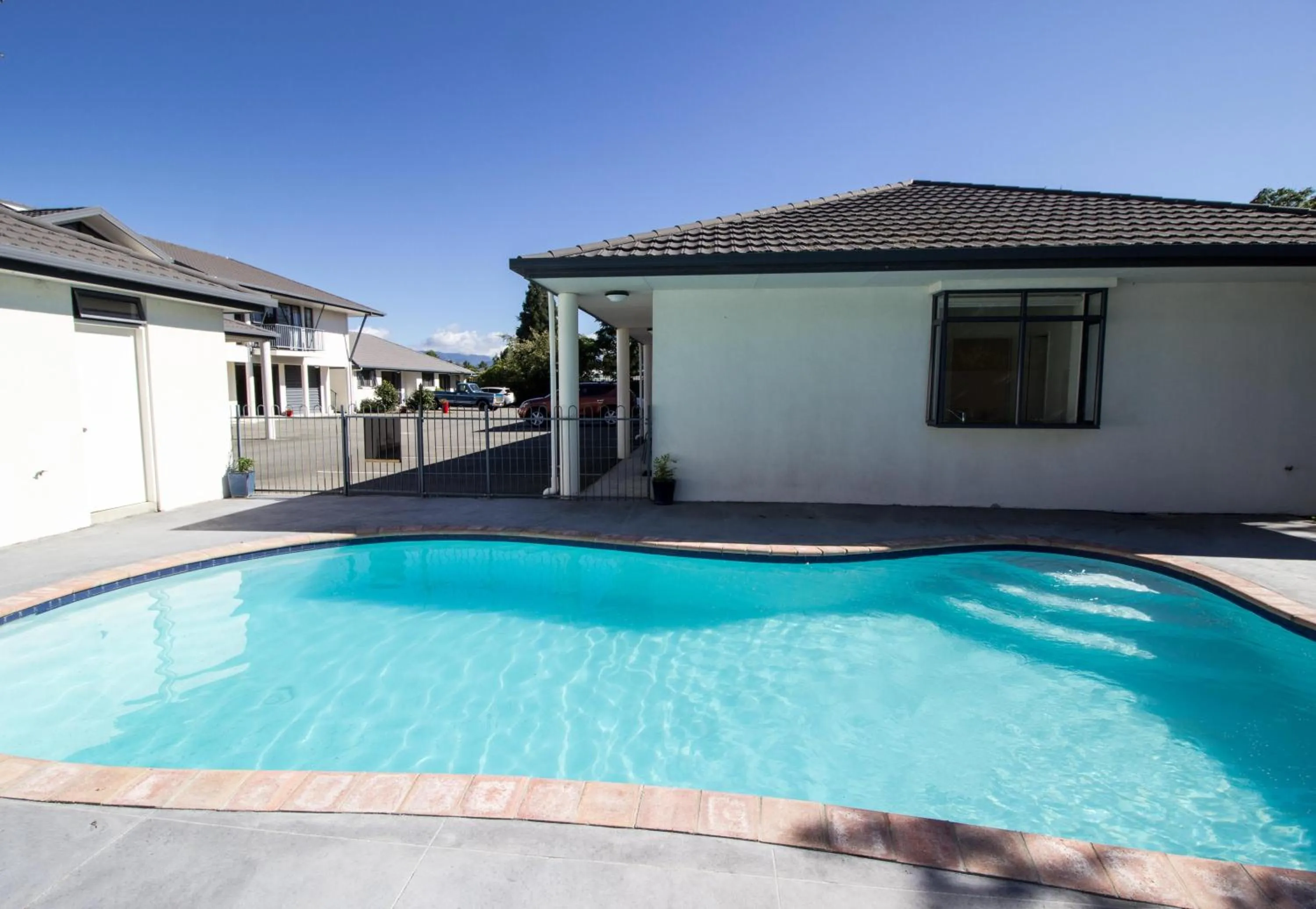 Swimming pool in ASURE Phoenix Motor Inn