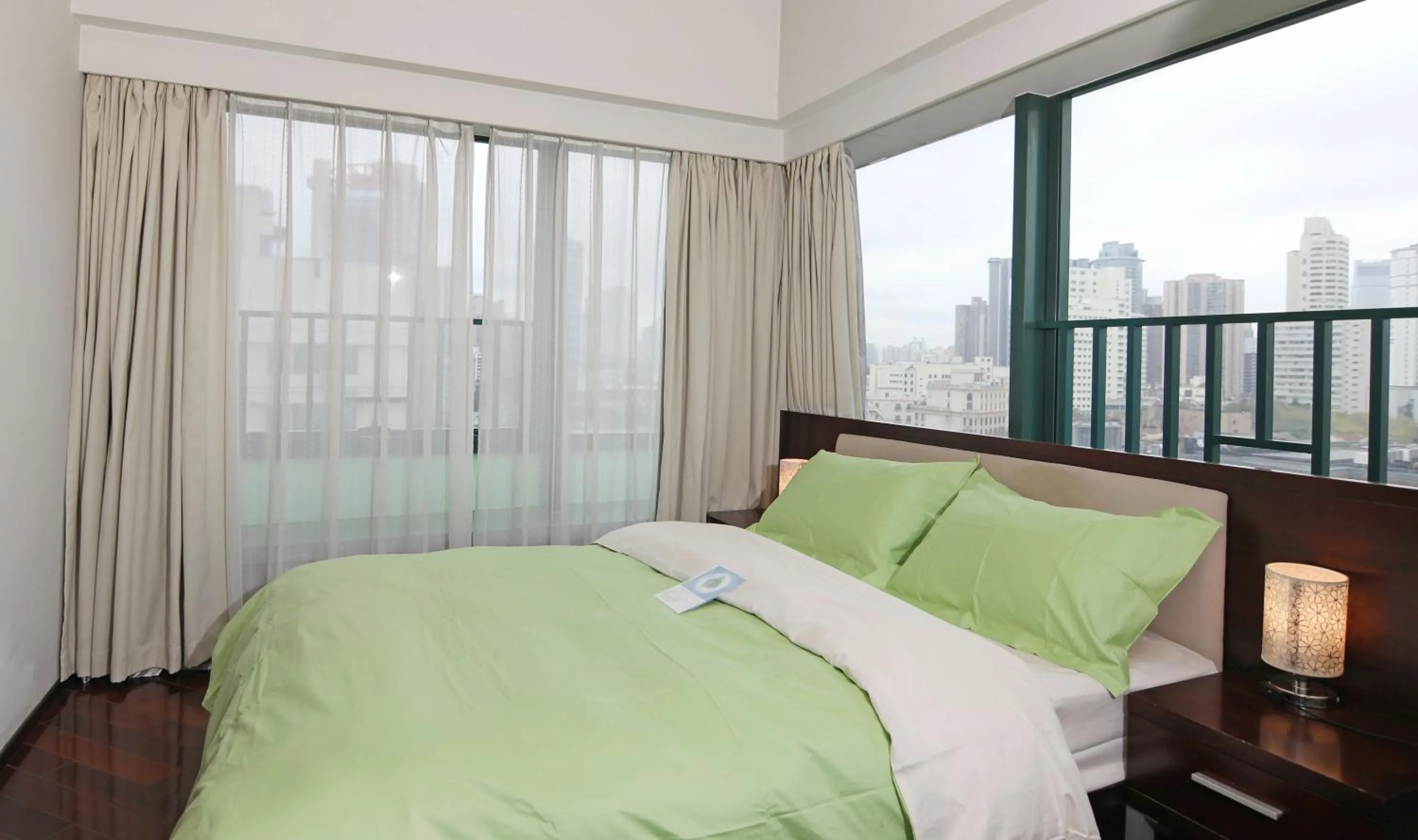 Bed in Shanghai Cosmo World Union Service Apartment